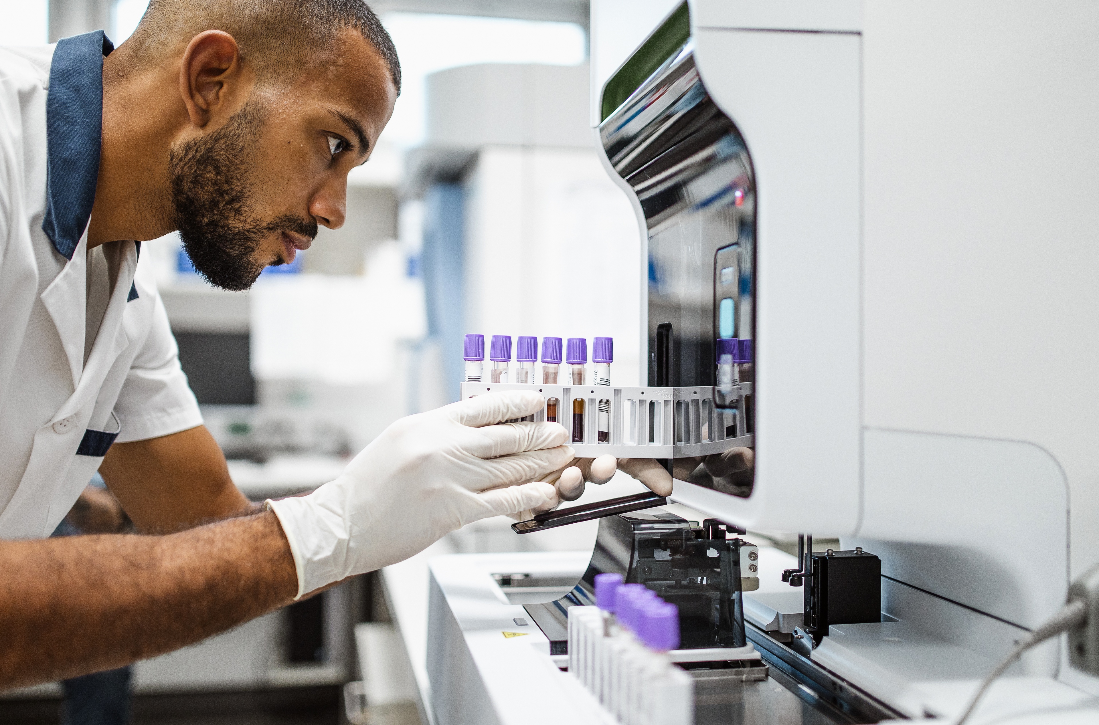 A man operating a med-tech device
