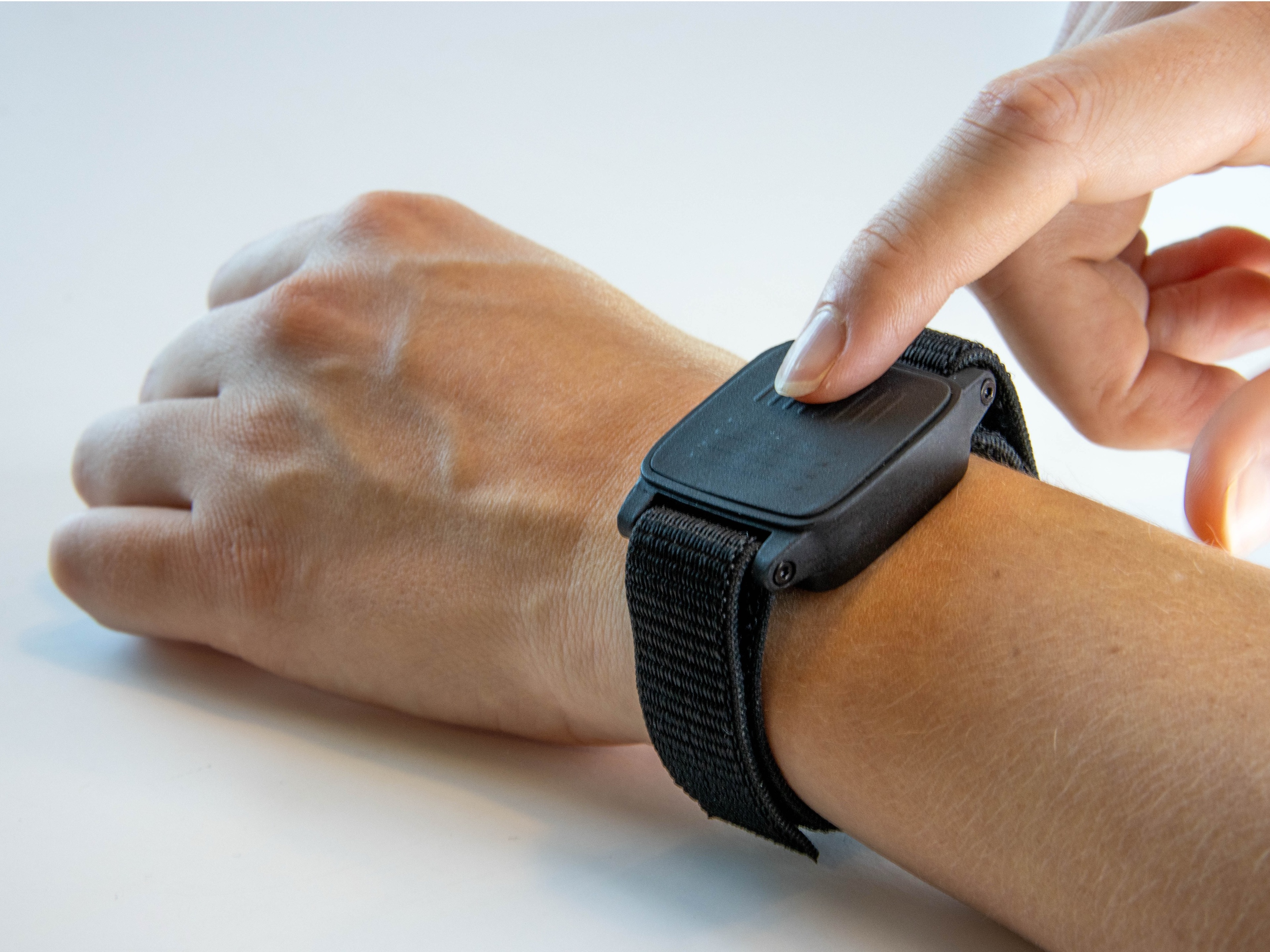 Close-up of a braille watch.