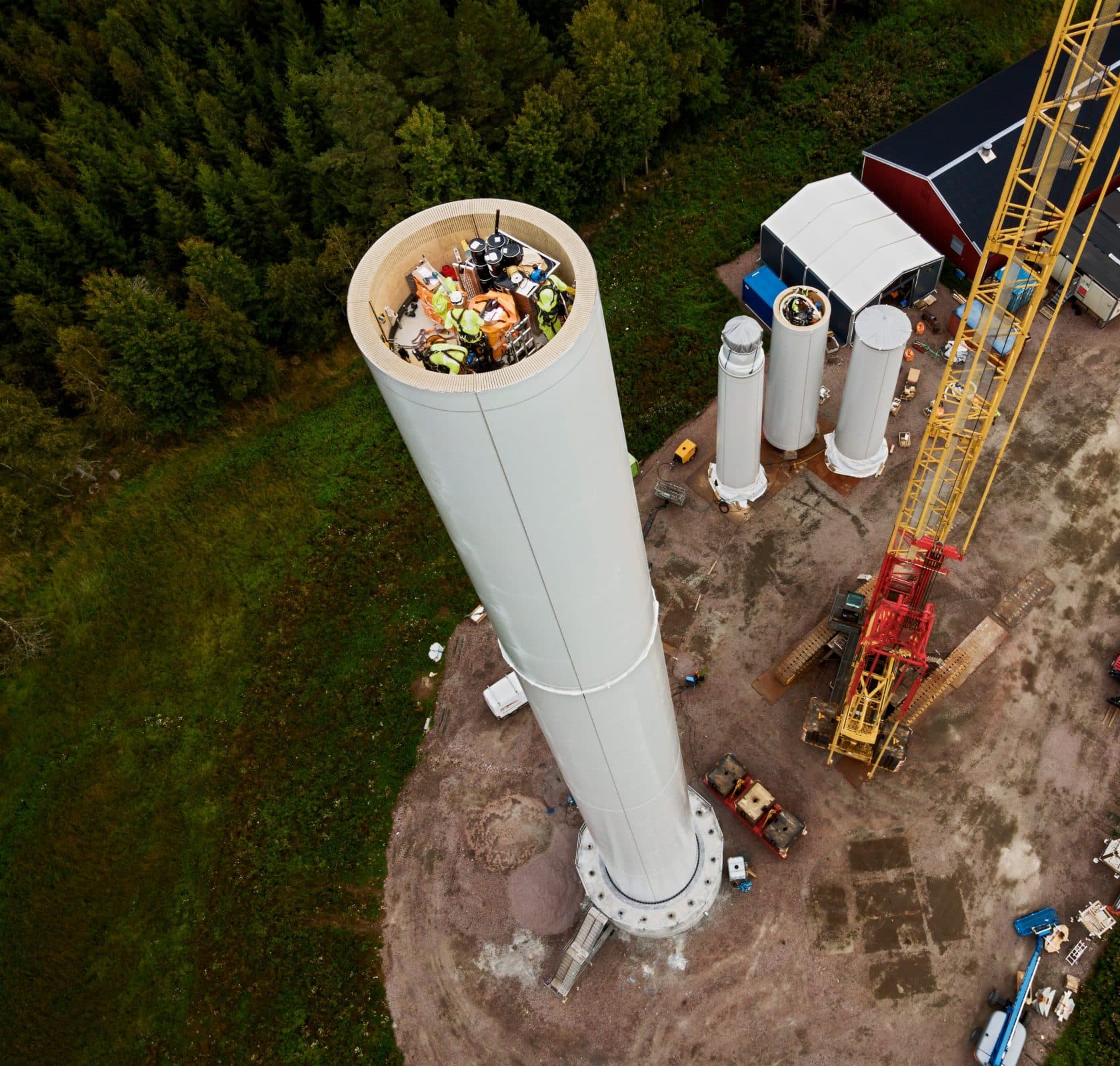 A wooden wind turbine under construction.