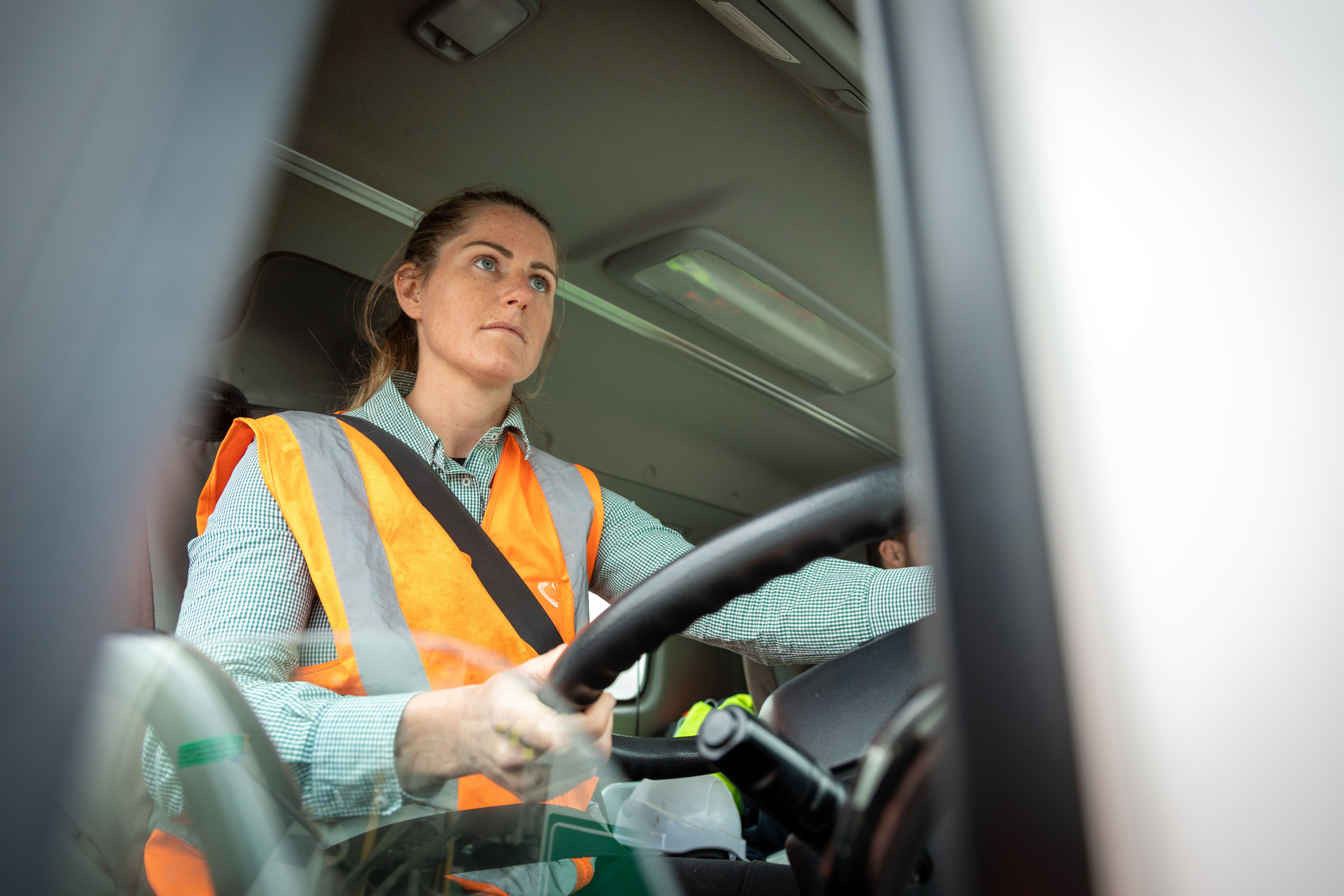 A women driving a truck