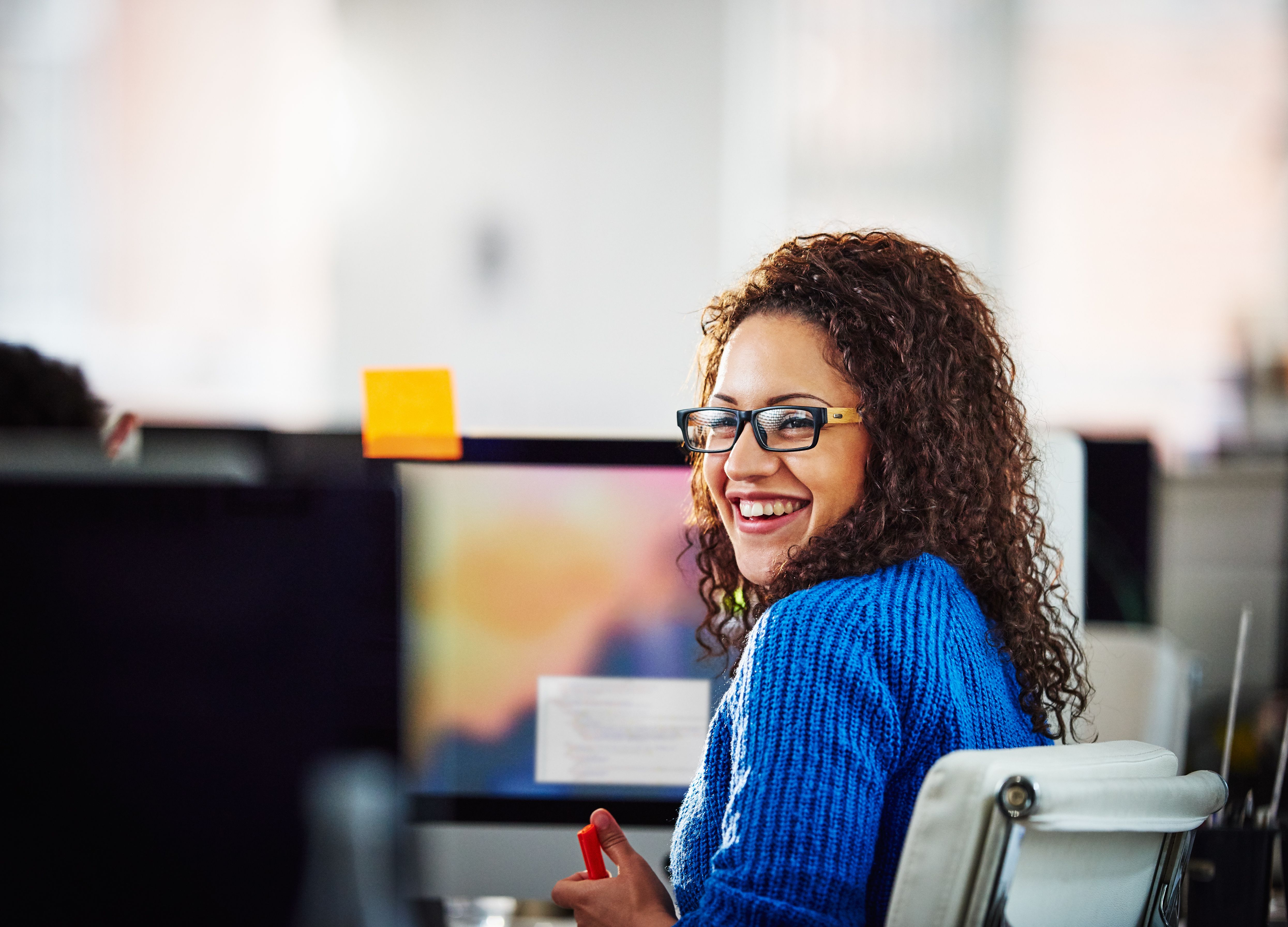 A women sitting in front of a computer