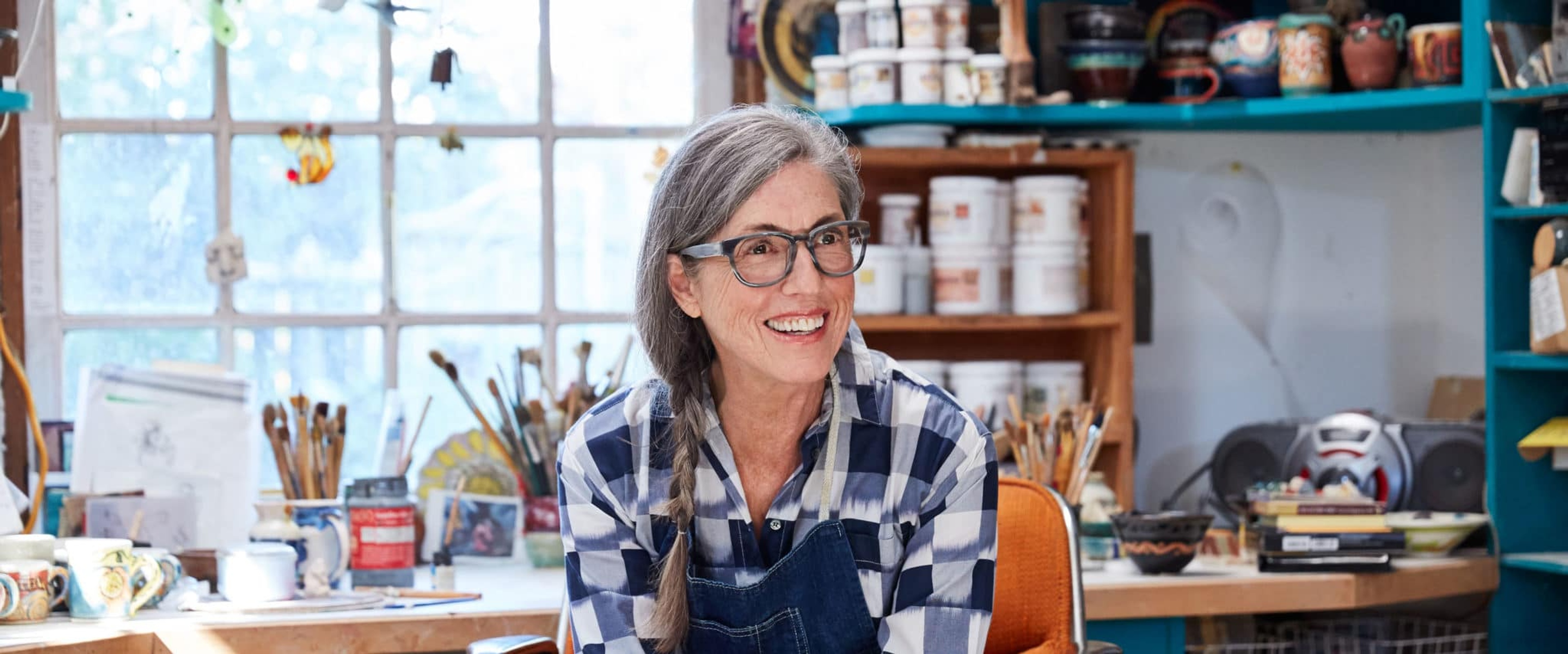 A woman in her painting studio