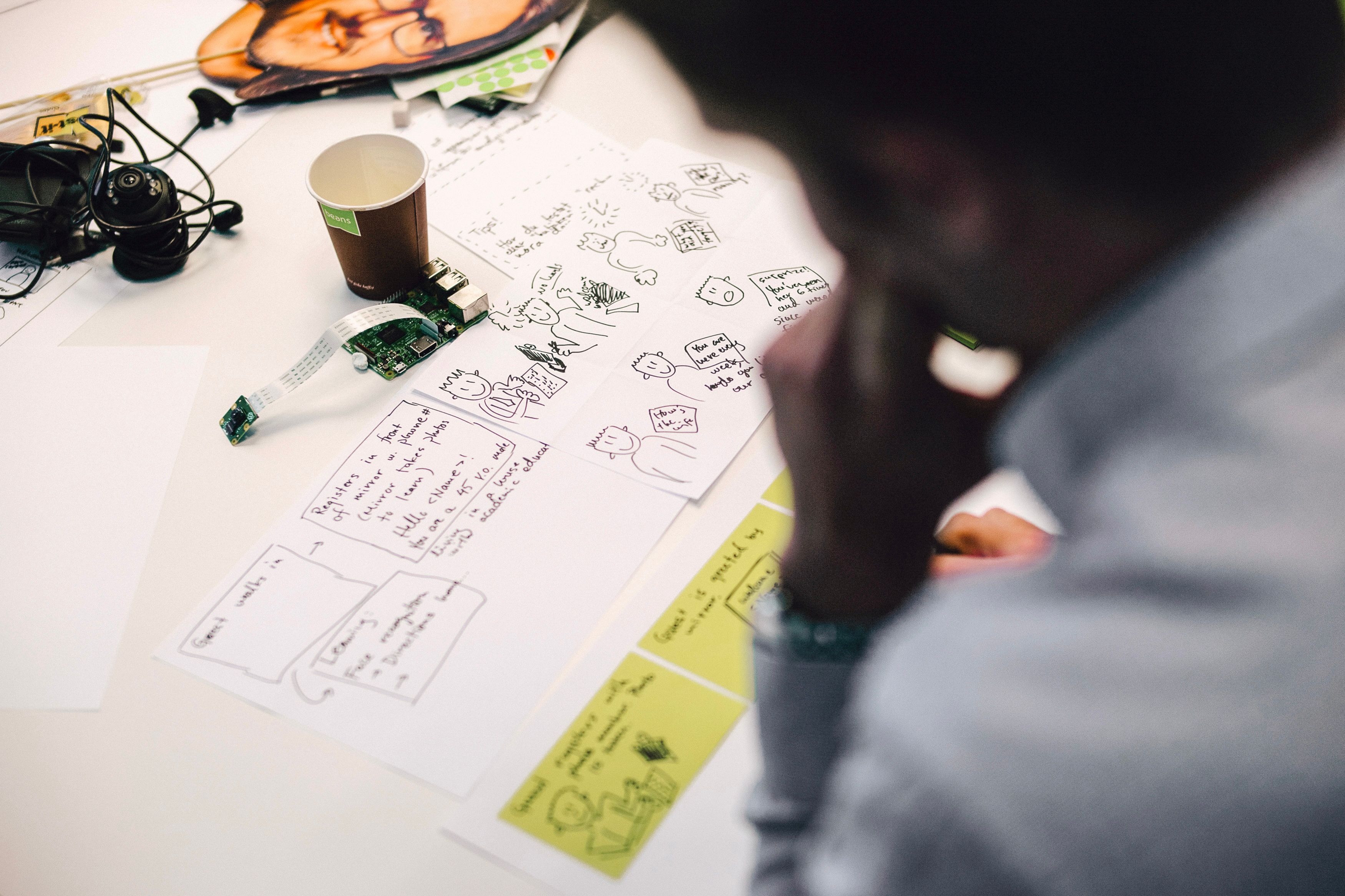 A person working on a design drawing