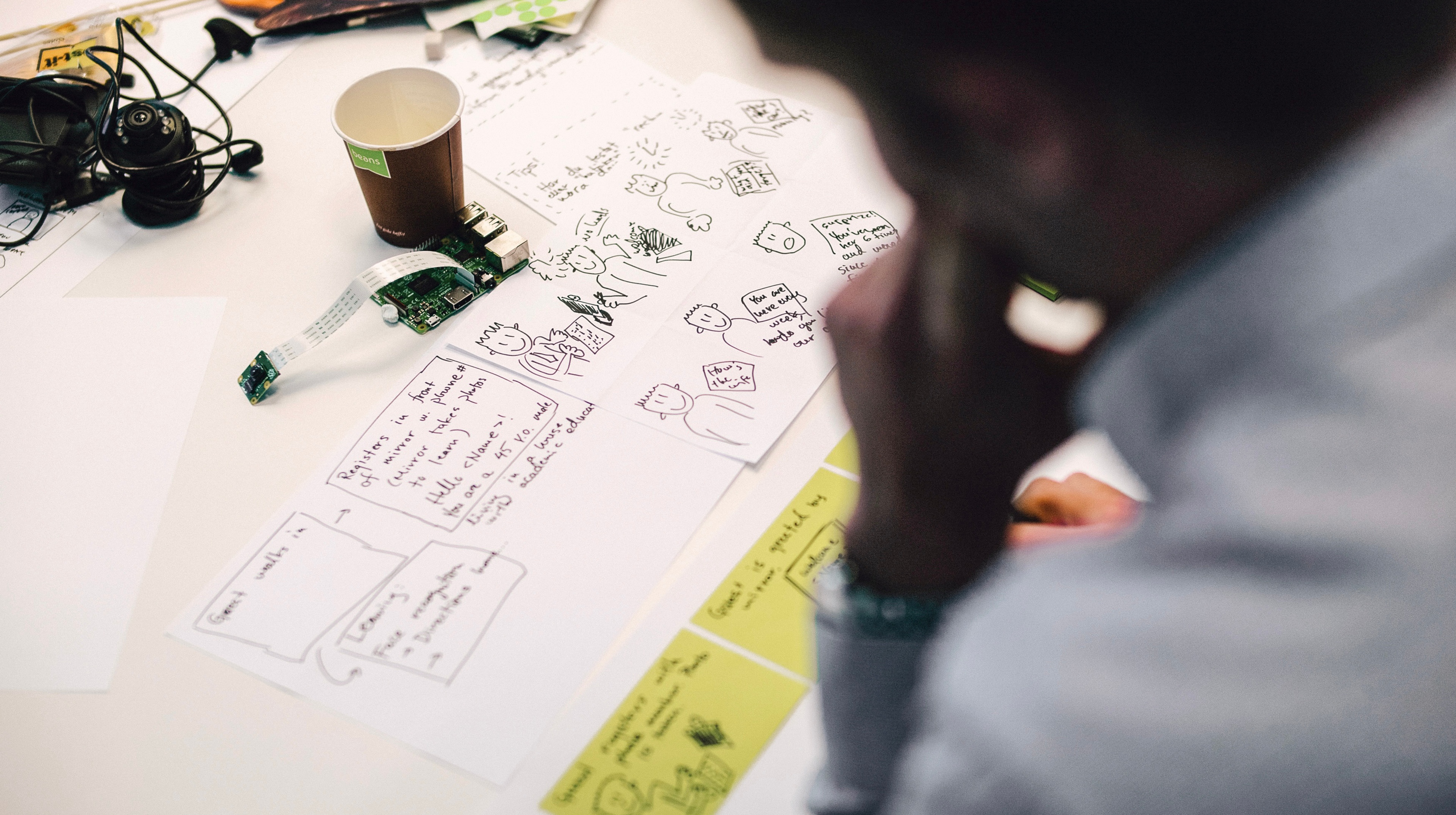 A person working on a design drawing