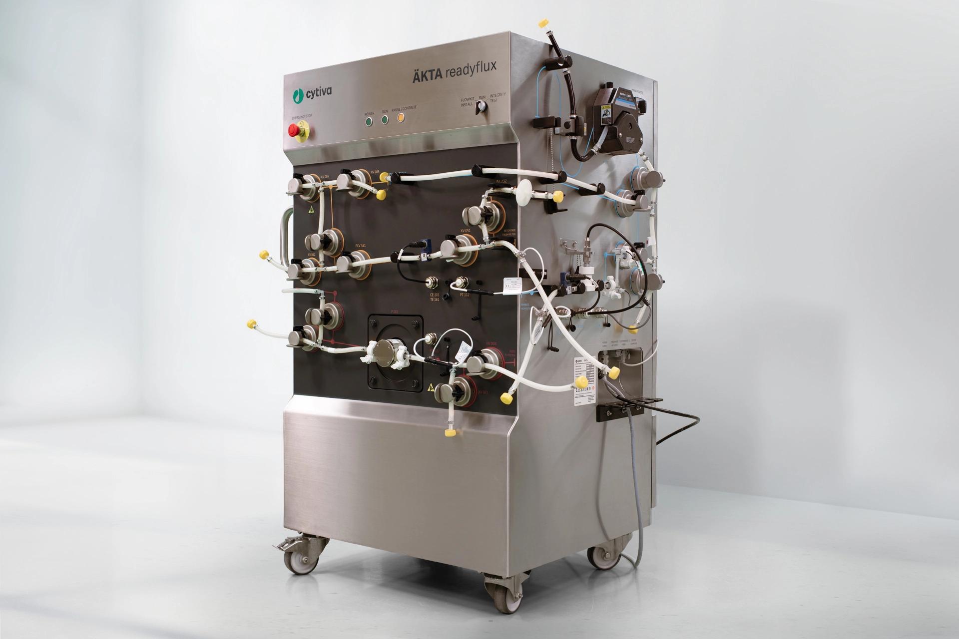 A big medtech instrument standing in a studio.