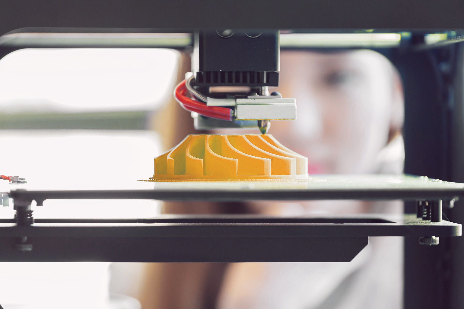 A 3D printer making a prototype