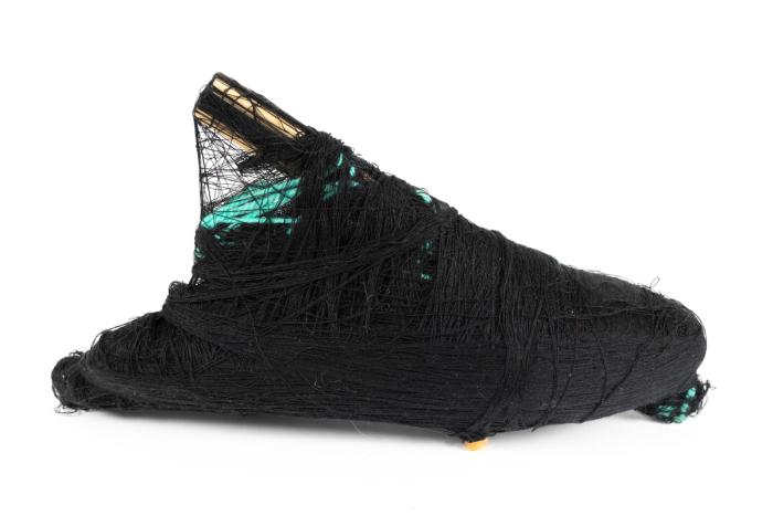 Mixed media sculpture including polyester thread, wood, cotton twine, masking tape, acrylic beads, and saran wrap, 10 x 3 x 6 in.