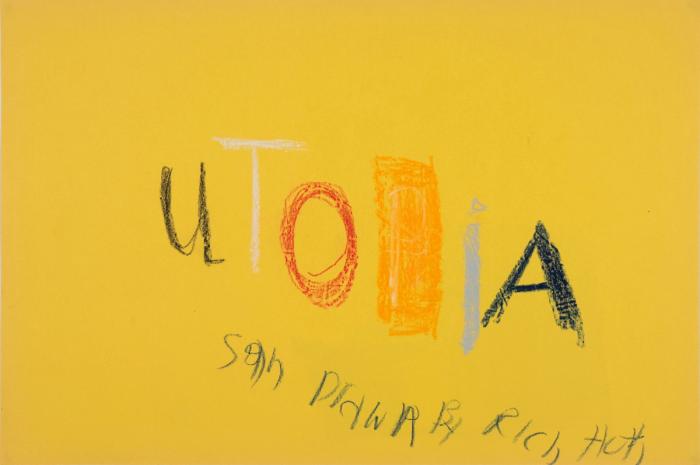 Colored pencil artwork on yellow construction paper featuring hand-drawn text that reads 'Utopia' in black, white, red, orange, gray, and blue letters.