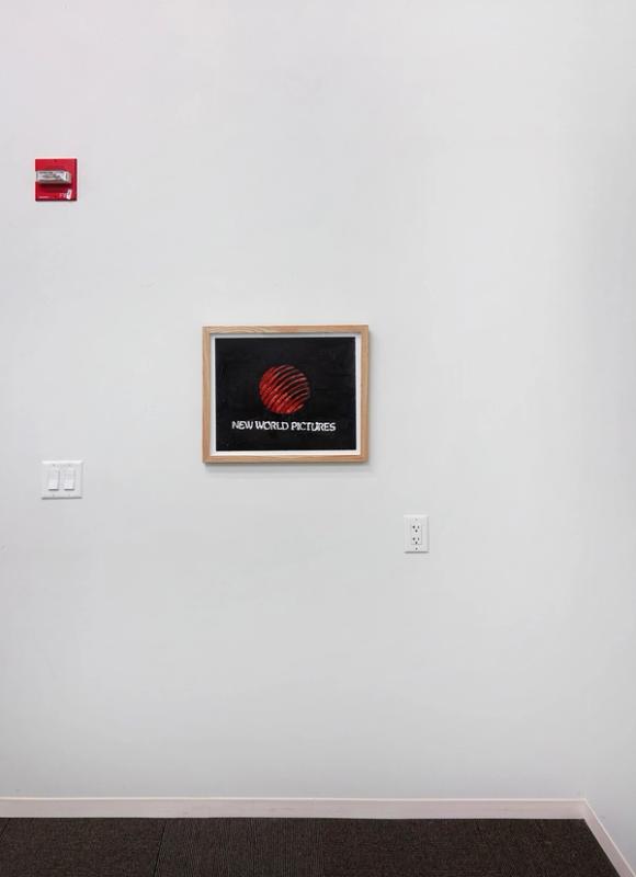 a white gallery wall with a painting in a light wooden frame. the paintings has a red stylized orb in the centaer made of several long lines. below it in white text reads 'New World Pictures'