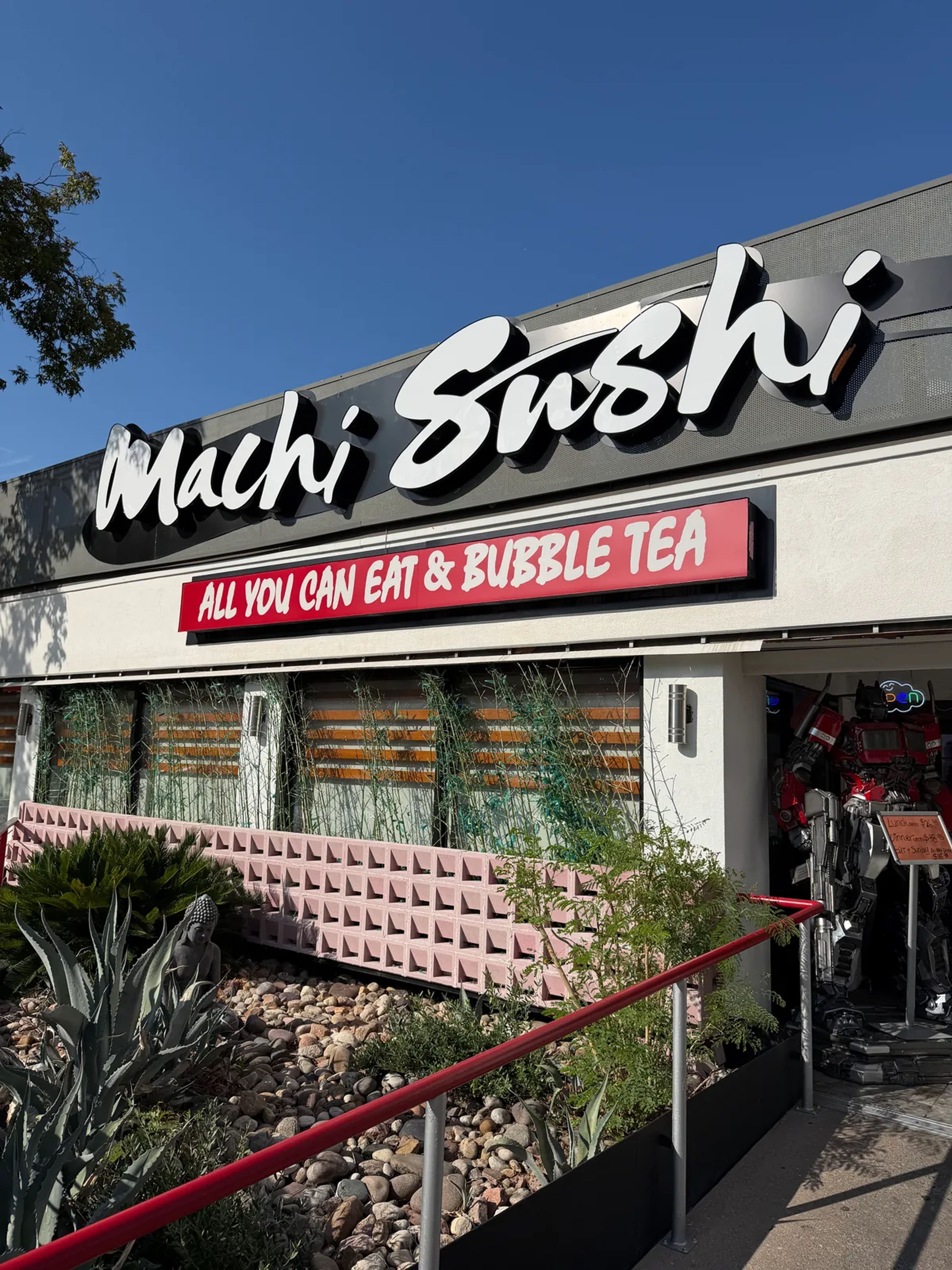 The front of Machi Sushi, with a red sign reading All You Can Eat and Bubble Tea under the name
