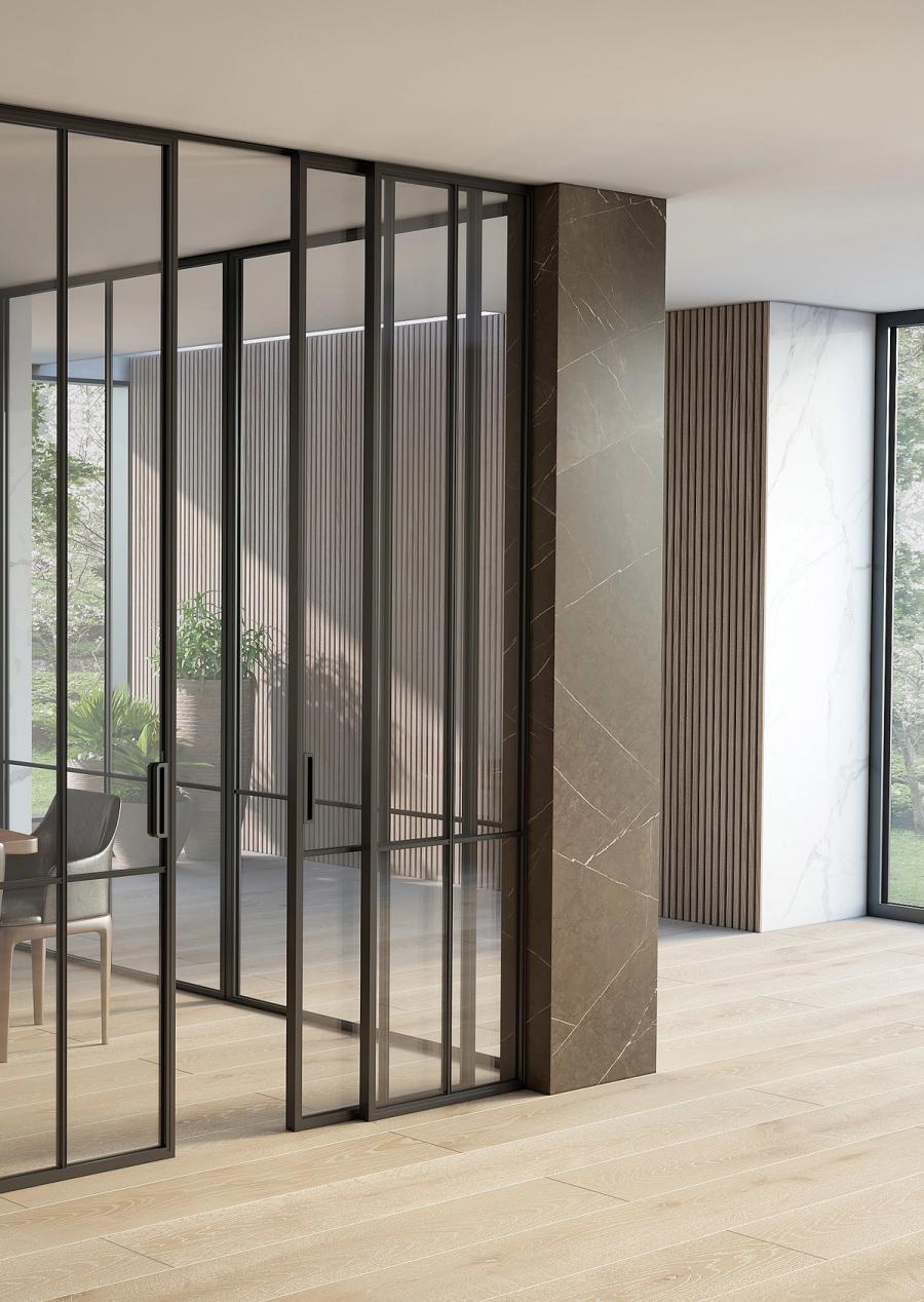 SHOJI Classic partition at a walk-in wardrobe entrance, Quadra grid pattern, fluted glass blurring the interior contents, fingerprint reader set flush into the 
