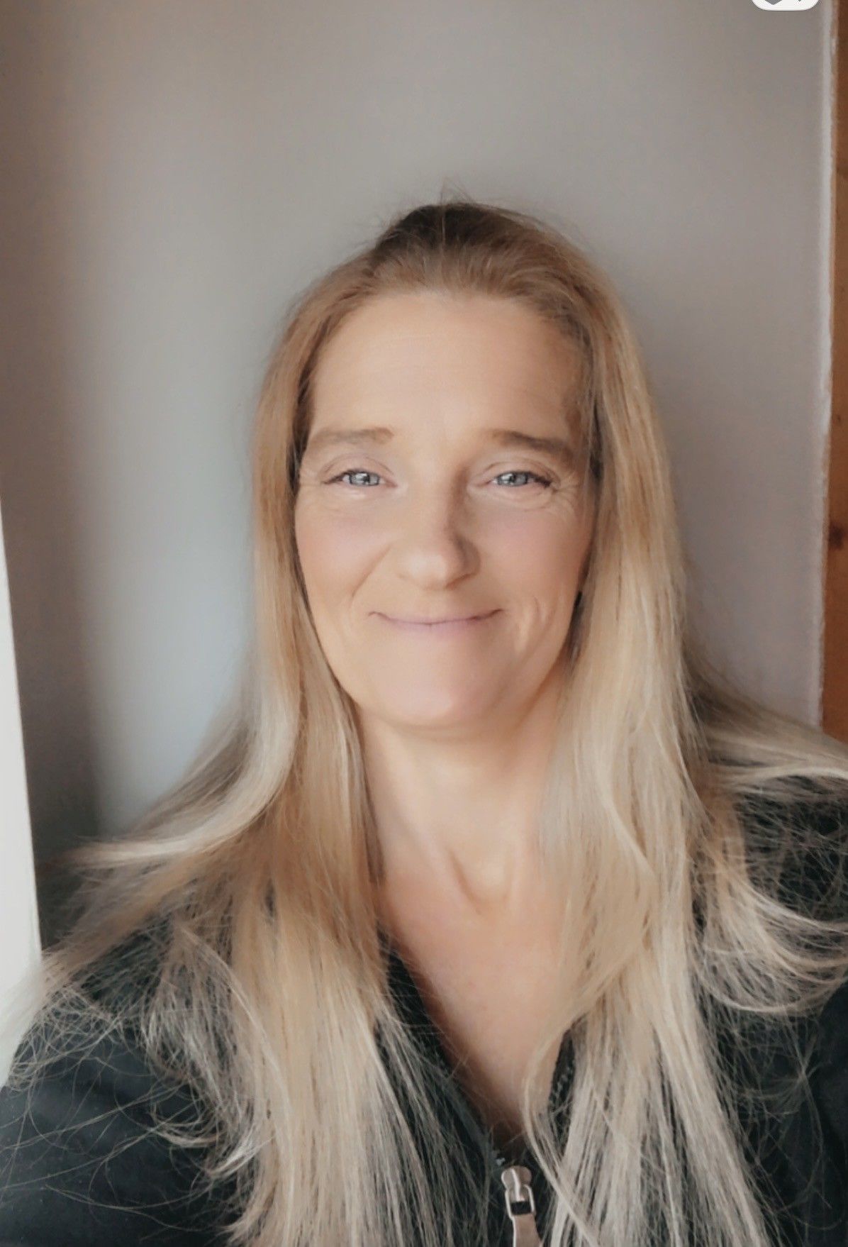 Emma Nicholas, Resident Champion Consultant at HouseKrowd, smiling in a professional headshot alongside HouseKrowd branding.