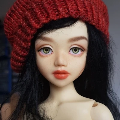 Female resin ball-jointed doll with long black hair and a sweet but stern face, wearing a red beret.