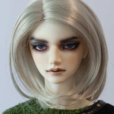 Male ball-jointed doll with thick eyebrows, heavy eyeshadow, and long silver hair.