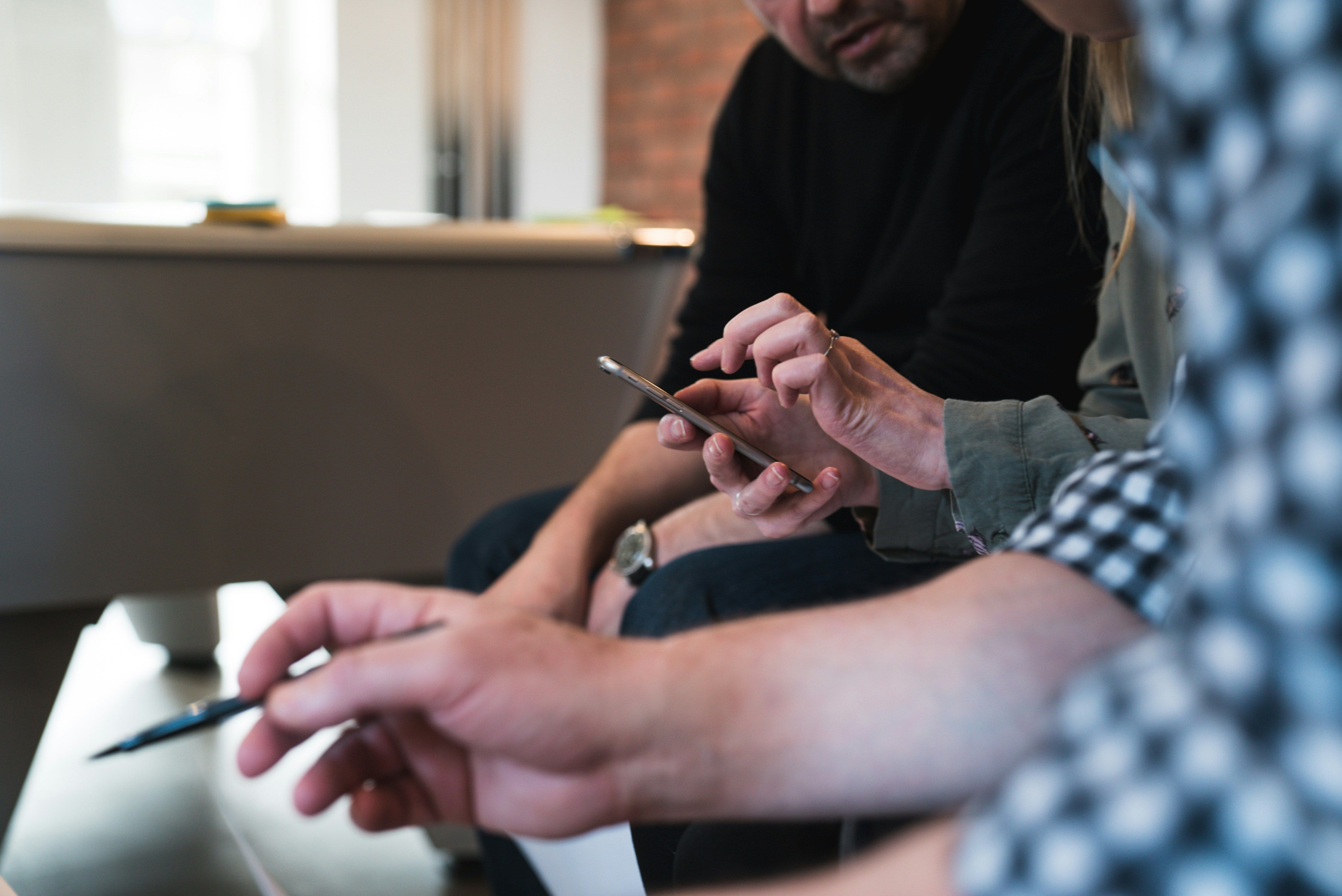 group of people testing an app