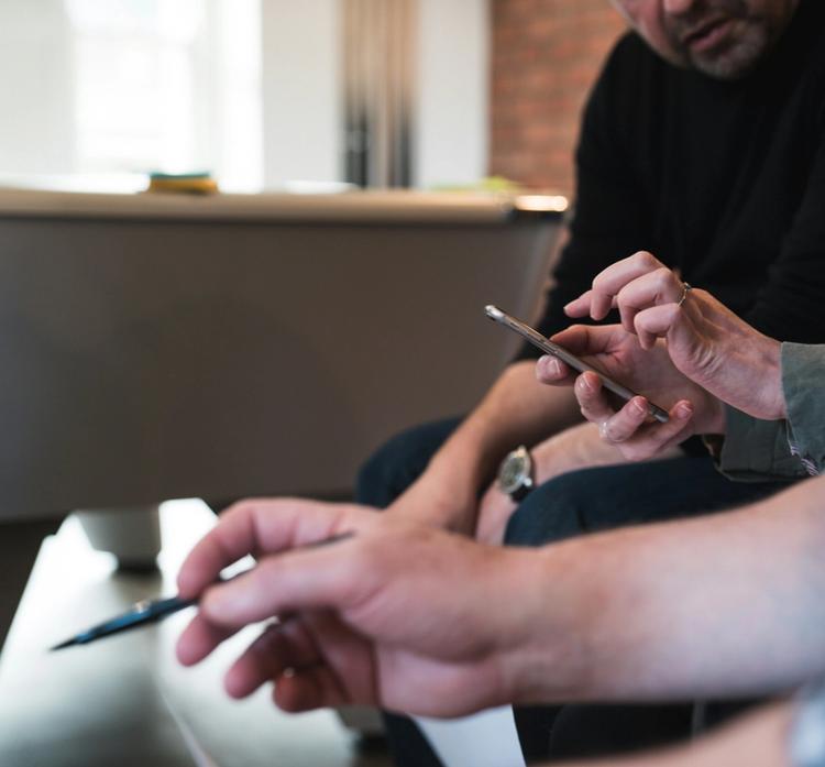 group of people testing an app