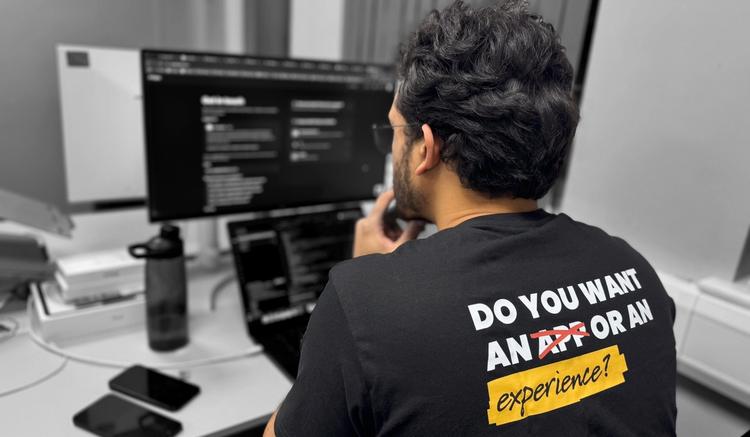 one of our developers working on their computer