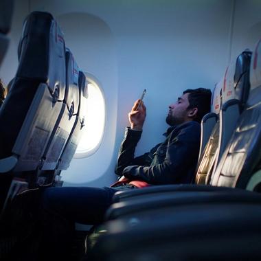 using phone on an airplane using phone on an airplane