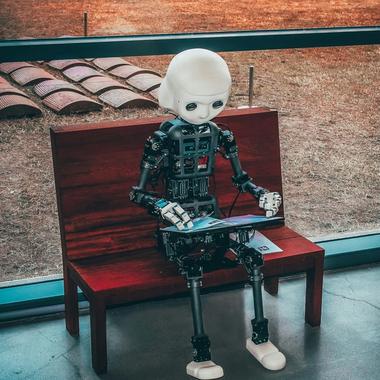ai robot using laptop ai robot using laptop
