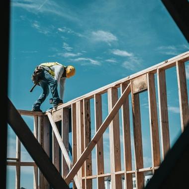 man building a house man building a house