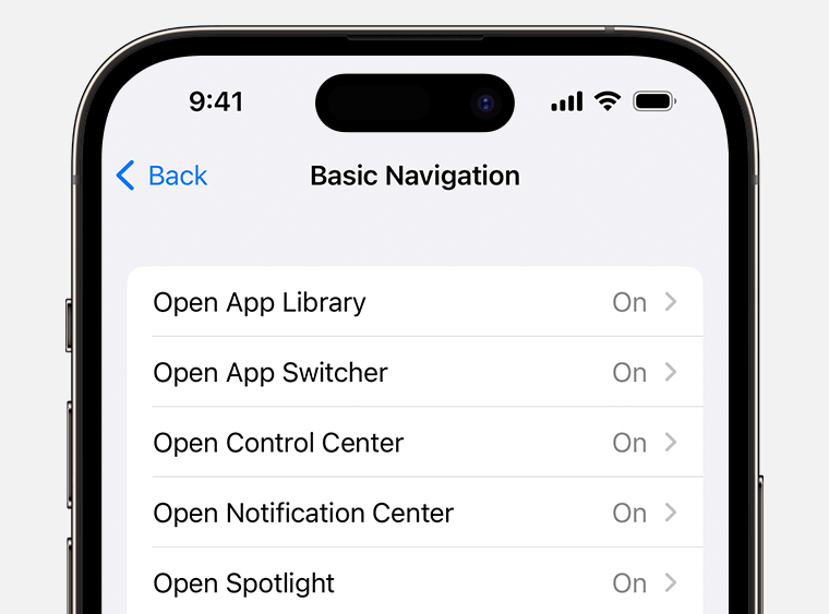 Close-up of an iPhone screen showing the 'Basic Navigation' settings menu with options like 'Open App Library,' 'Open App Switcher,' 'Open Control Center,' 'Open Notification Center,' and 'Open Spotlight,' all toggled to 'On.'
