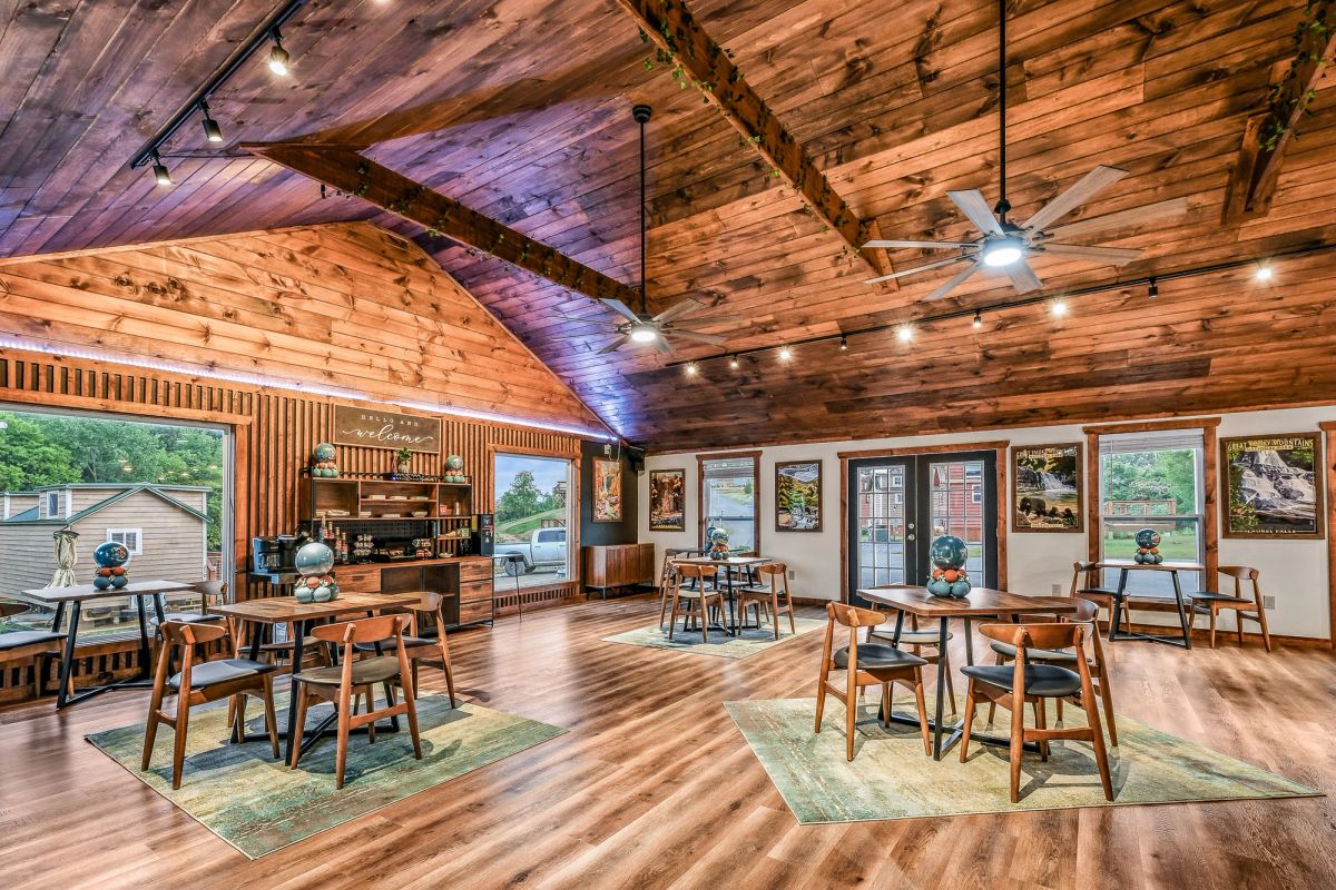 Sojourn Lodging Welcome Center with soaring vaulted wood ceiling and community gathering space