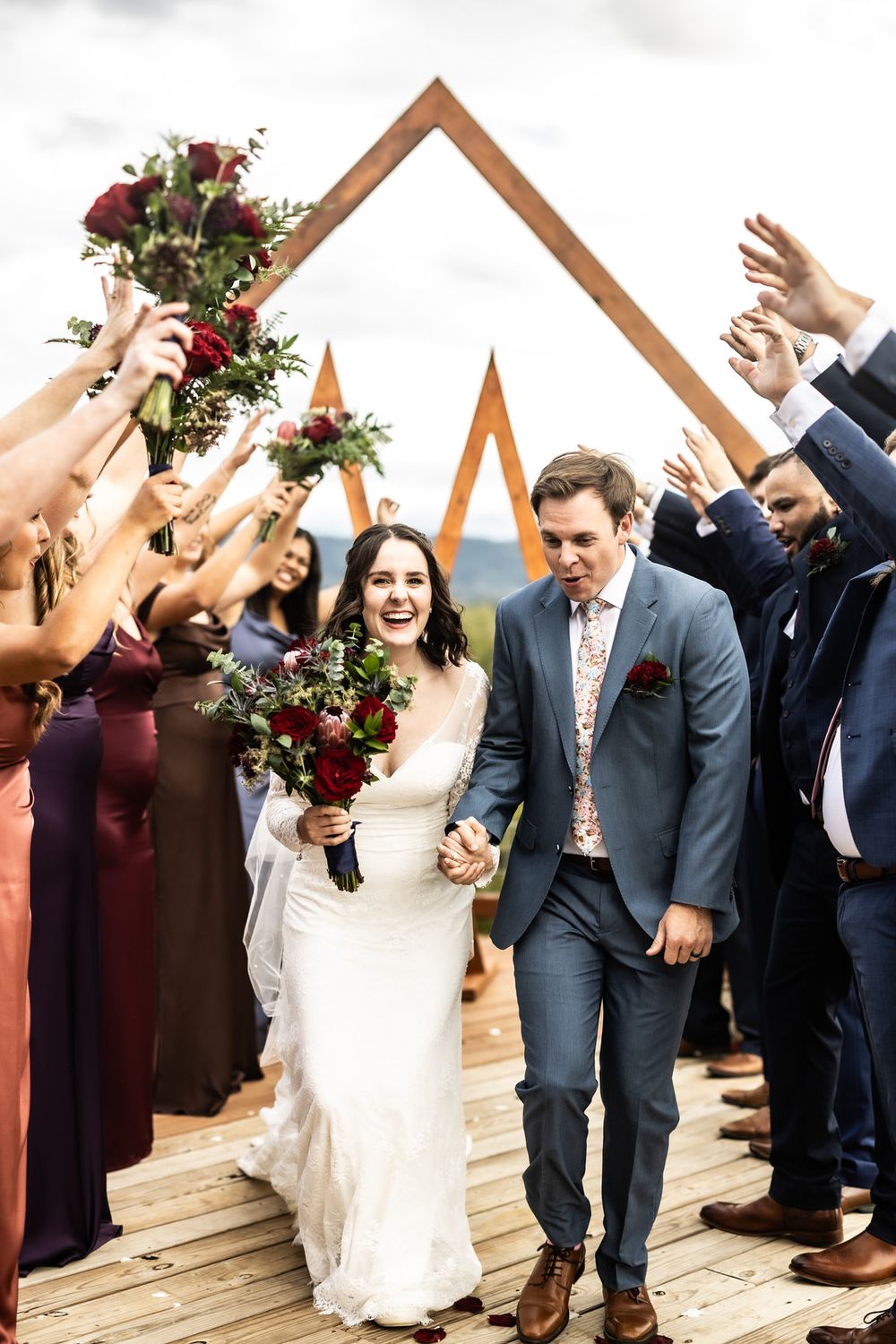 Bride and groom recessional on the Observation Deck at Sojourn Lodging
