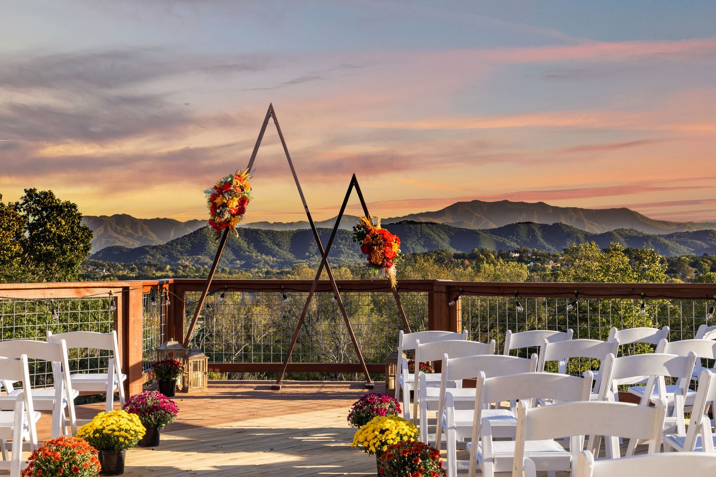 Wedding ceremony on the Observation Deck at Sojourn Lodging with Smoky Mountain sunset views