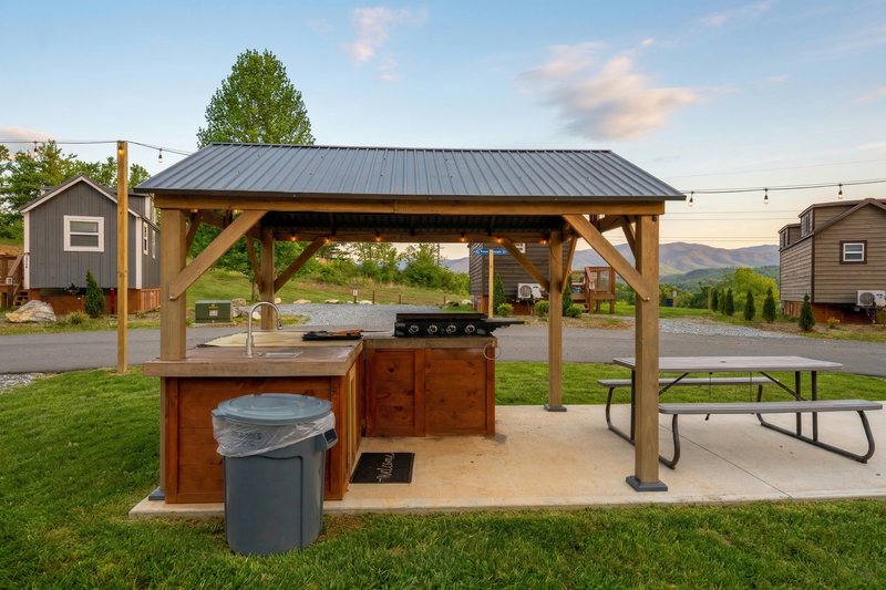 Cookout Zone pavilion with grill station at Sojourn Lodging