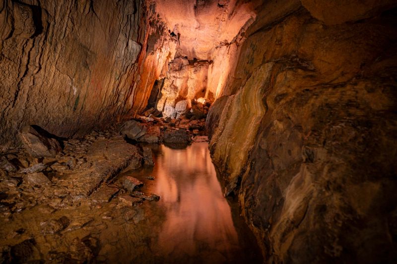 Interior orange-toned photo of our on-site cave and grotto.