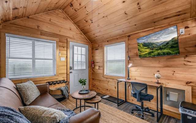 Open living area inside The Grove at Sojourn Lodging tiny home