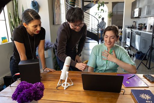 Musicians creating music with digital equipment