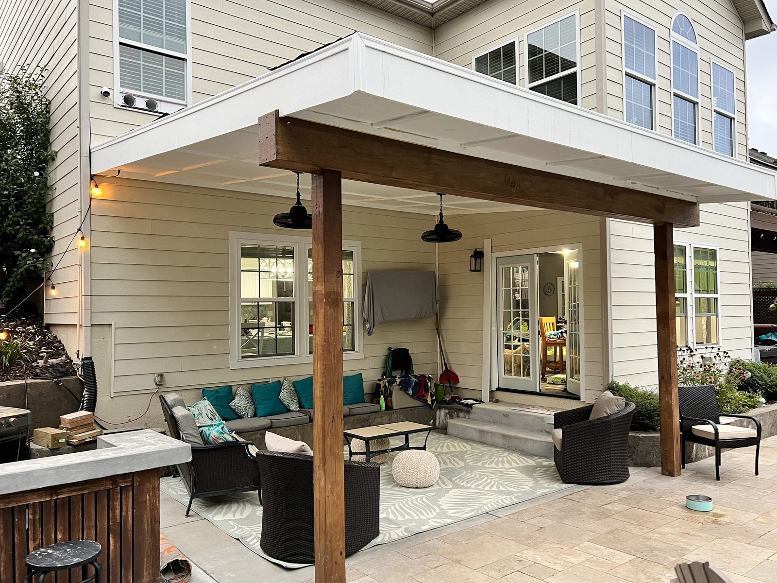 Covered patio with wood beams and outdoor sectional