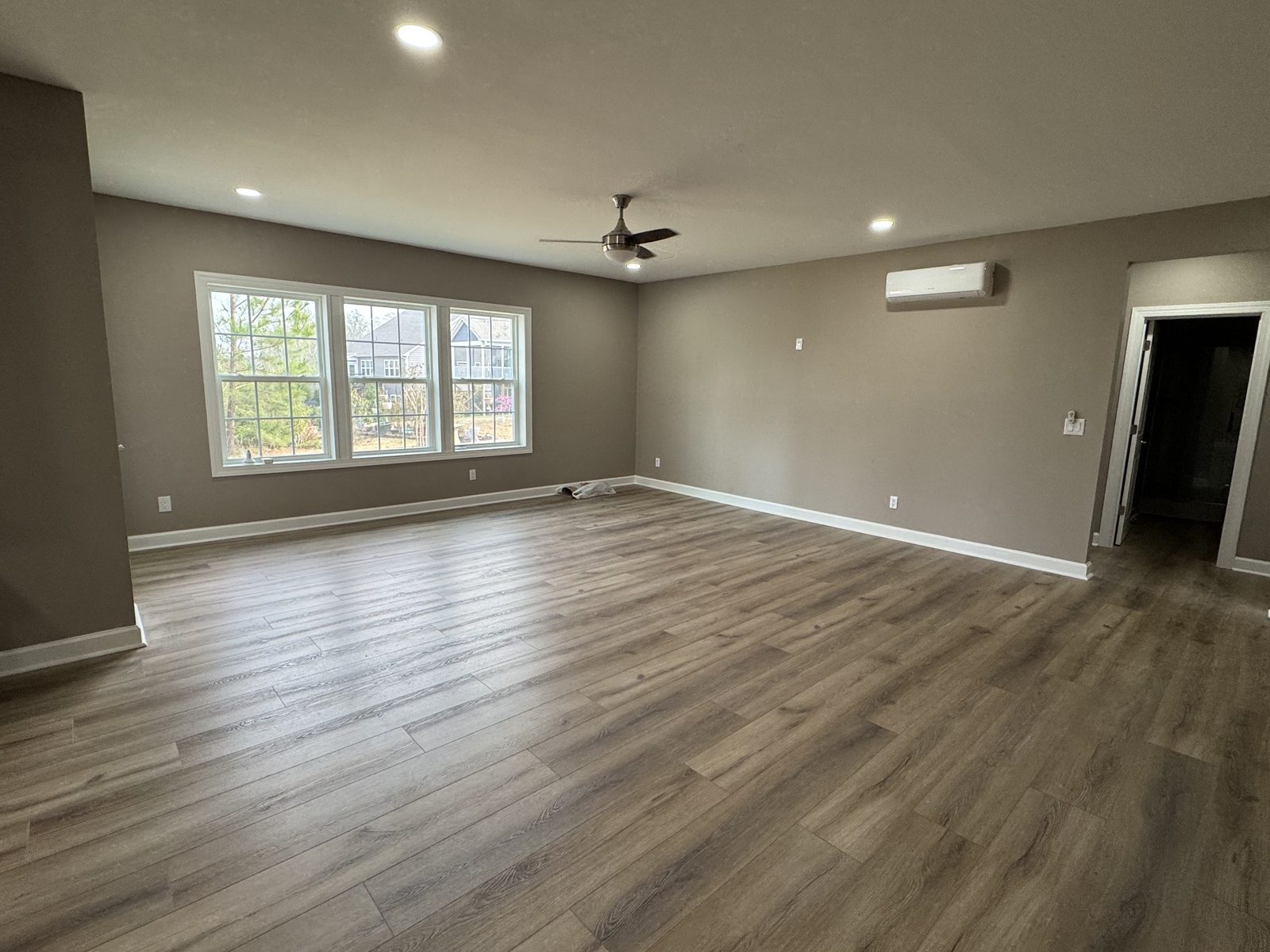 Bright living room with luxury vinyl plank flooring