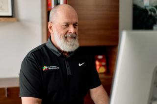 Dr. Christopher Mason at his computer