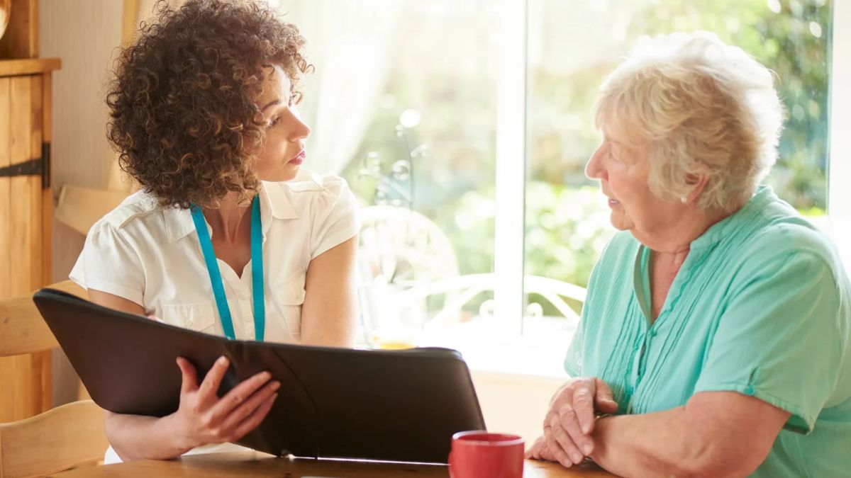 Bereavement counsellor providing grief support to a woman after her parent's death in Australia
