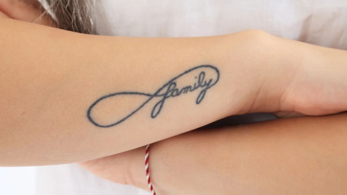 Memorial tattoo on a forearm honouring a late parent