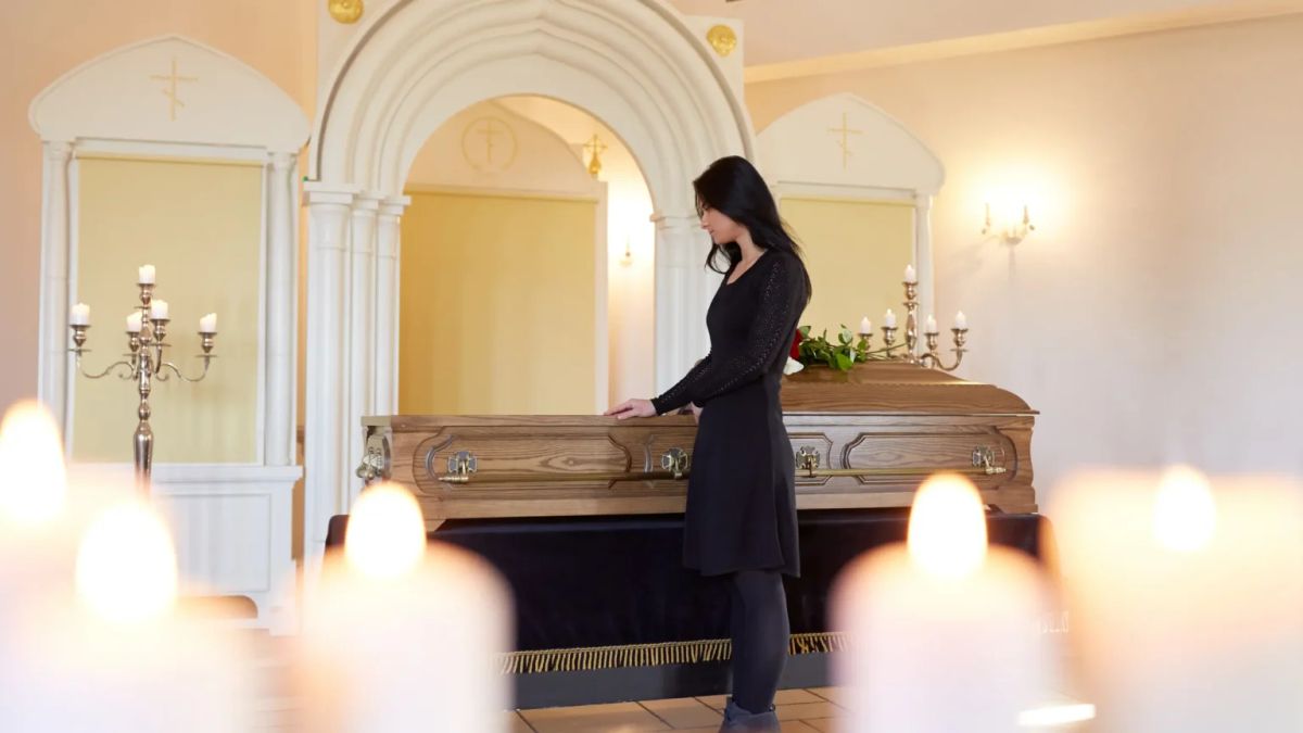 Funeral director preparing a service showing typical funeral costs in Australia