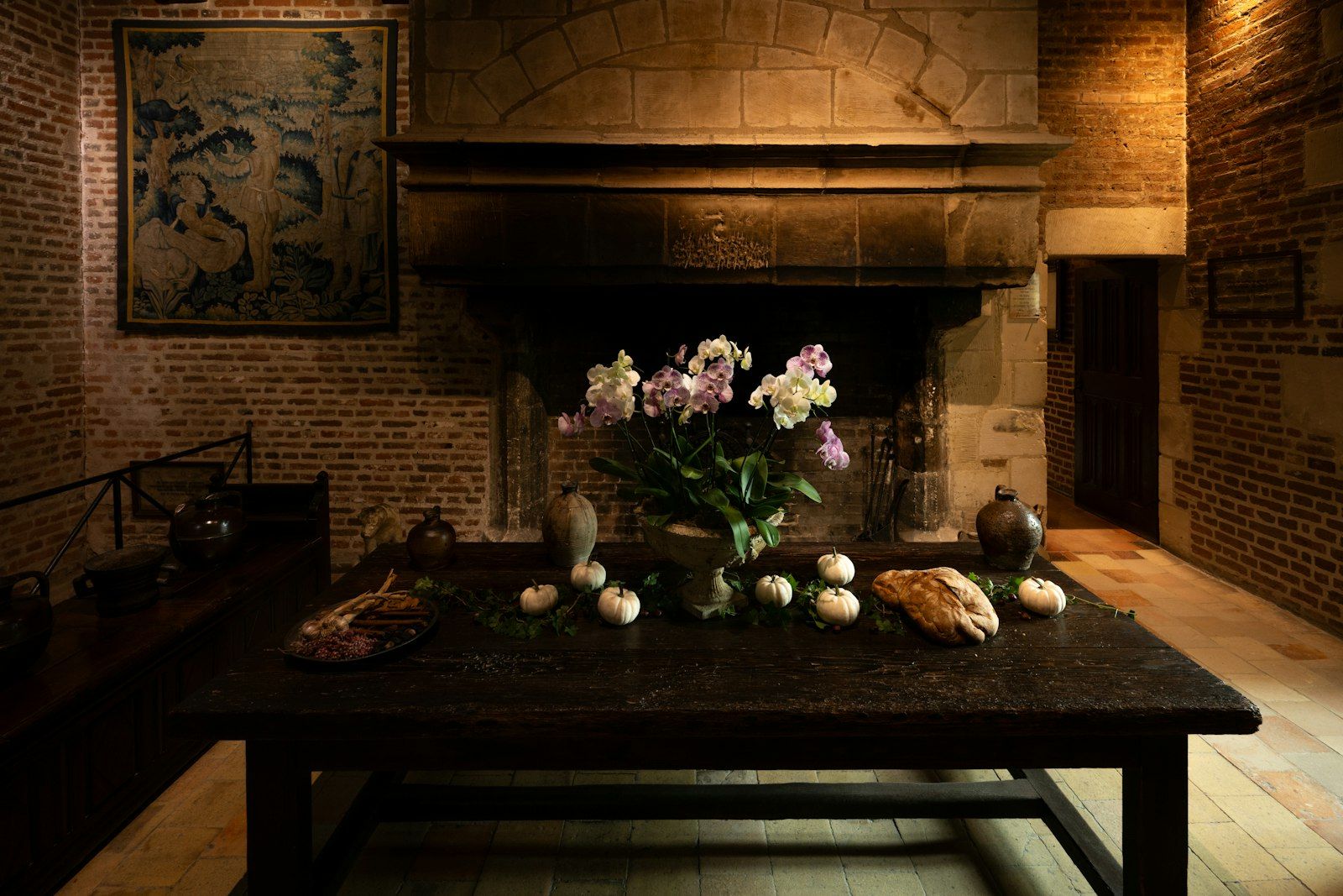 Table with flowers in a rustic room