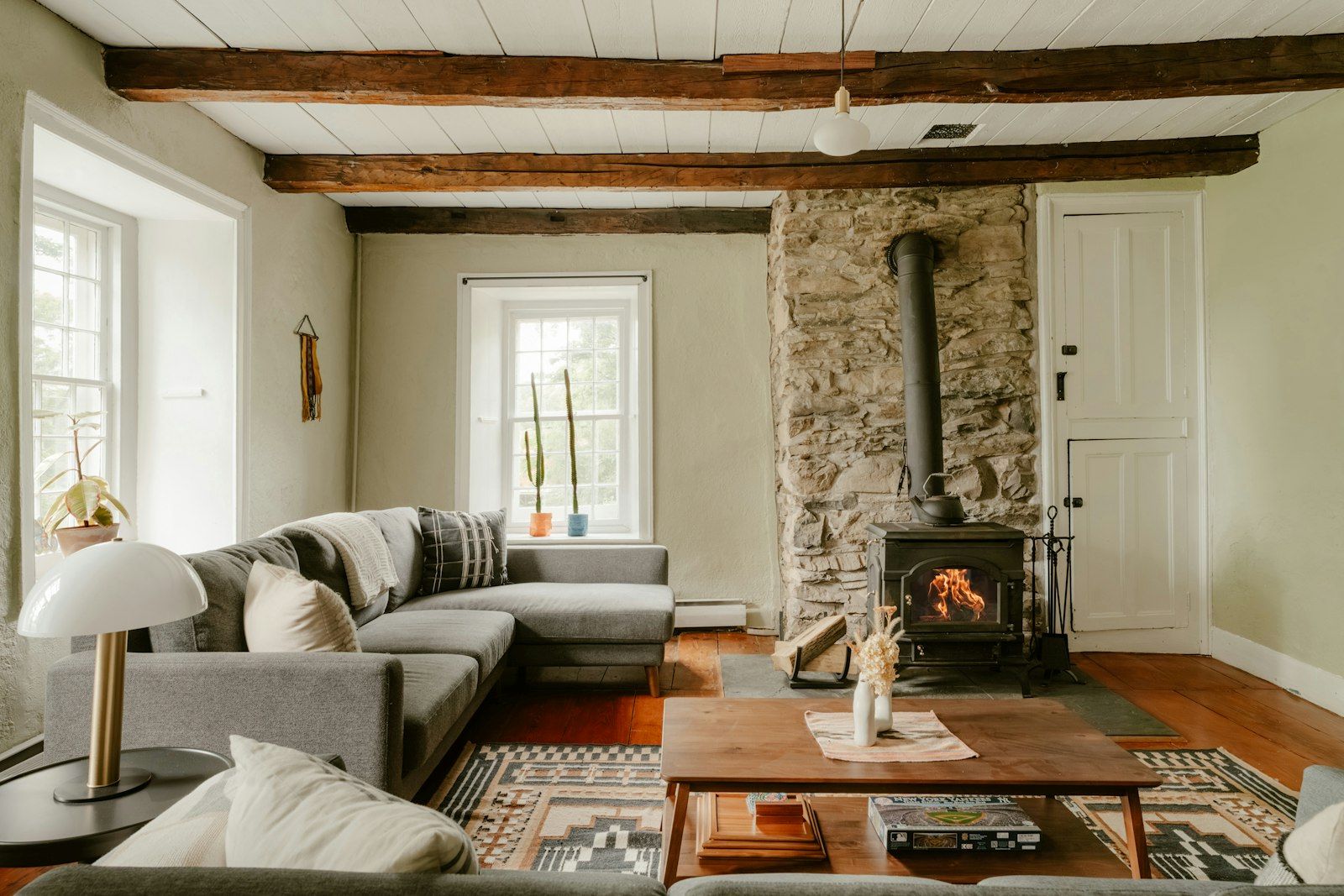 Cosy living room with a lit wood stove