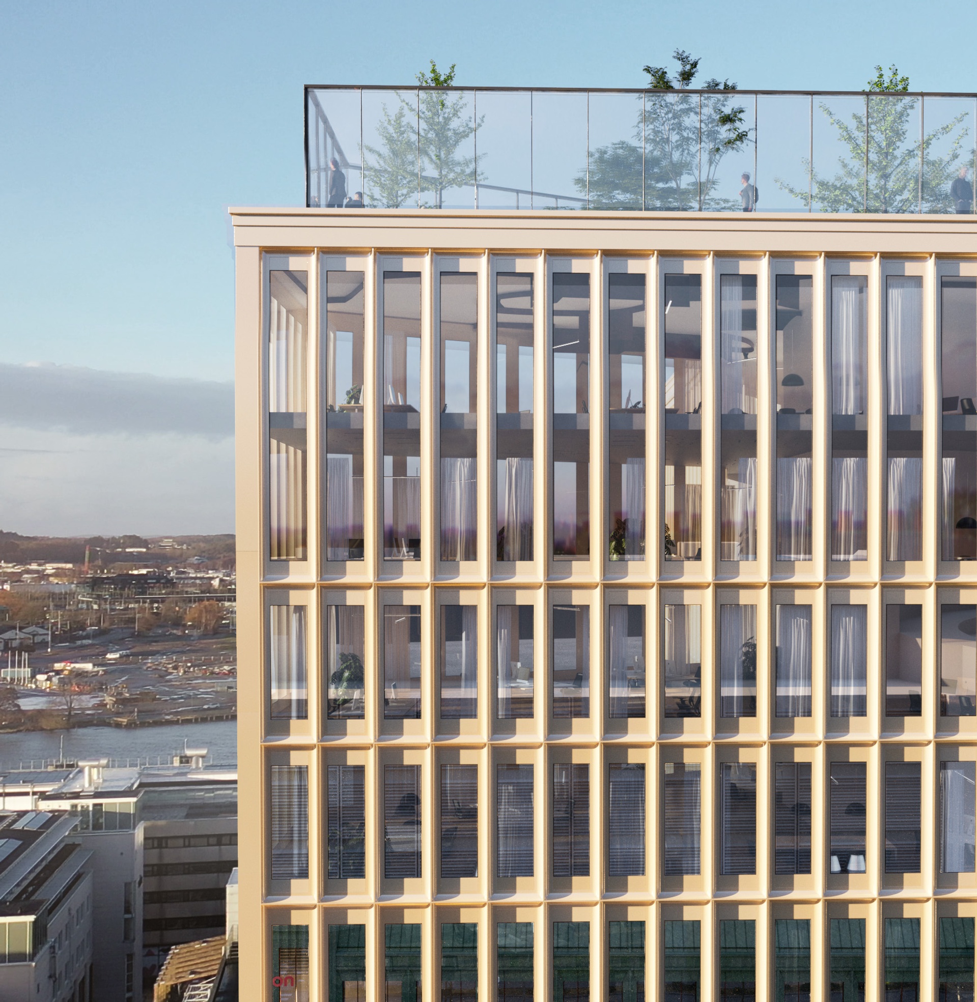 Noon, glasfasad och takpark.