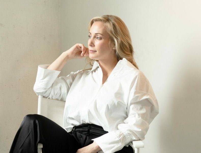 Cari Fund seated portrait