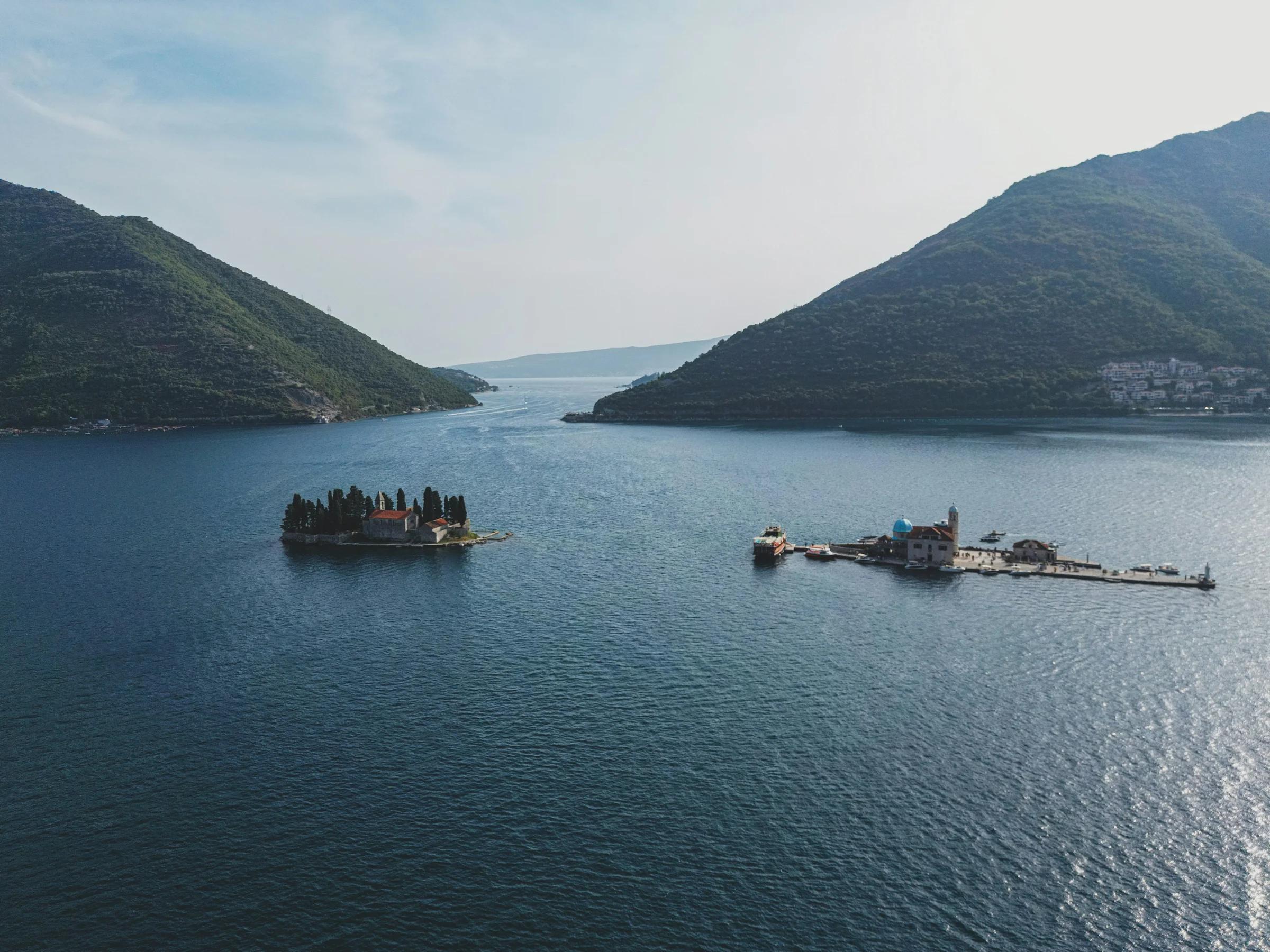 a large body of water surrounded by mountains