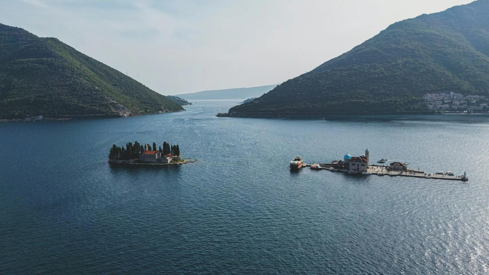 a large body of water surrounded by mountains