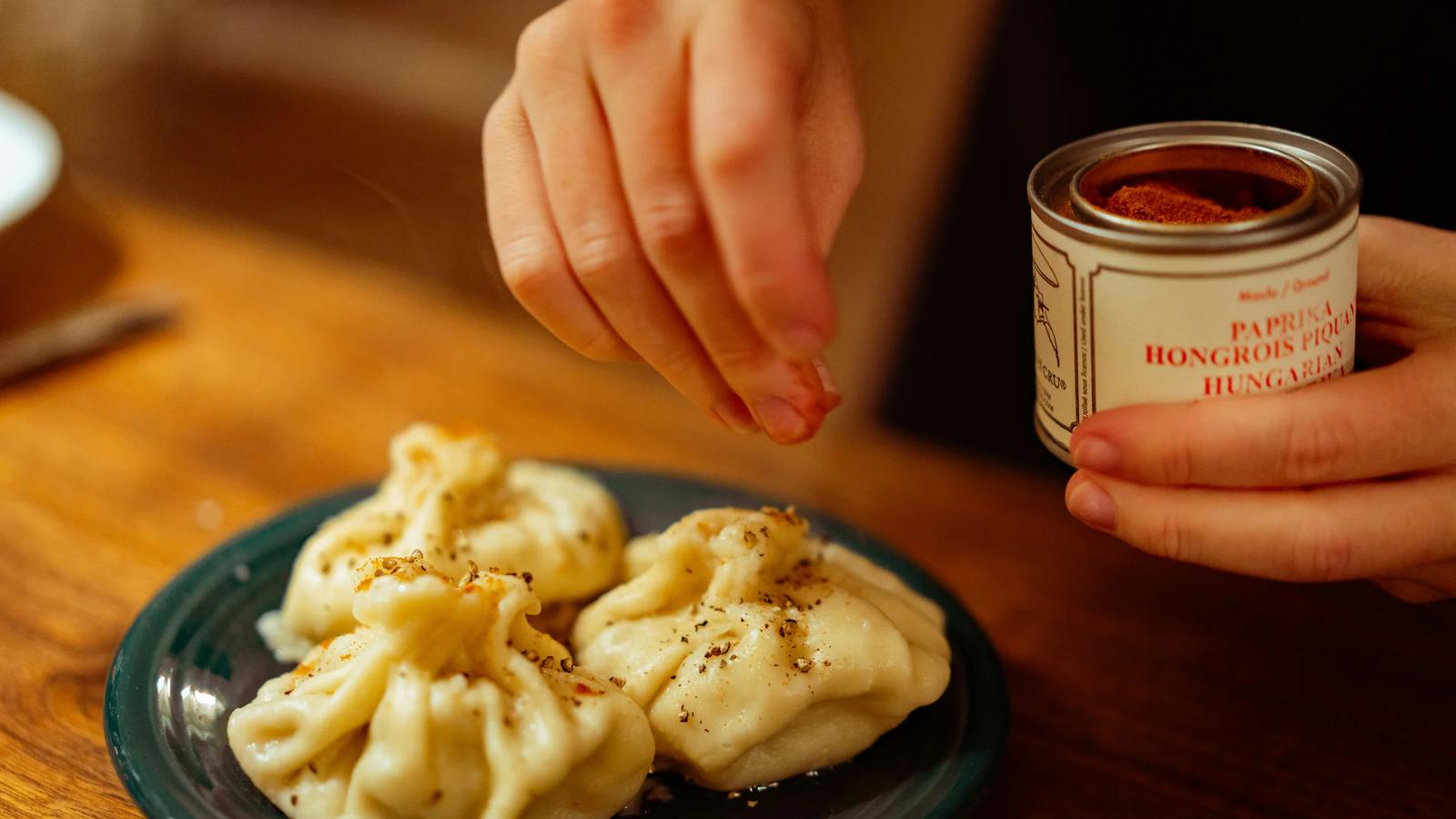 a plate of food and a can of sauce