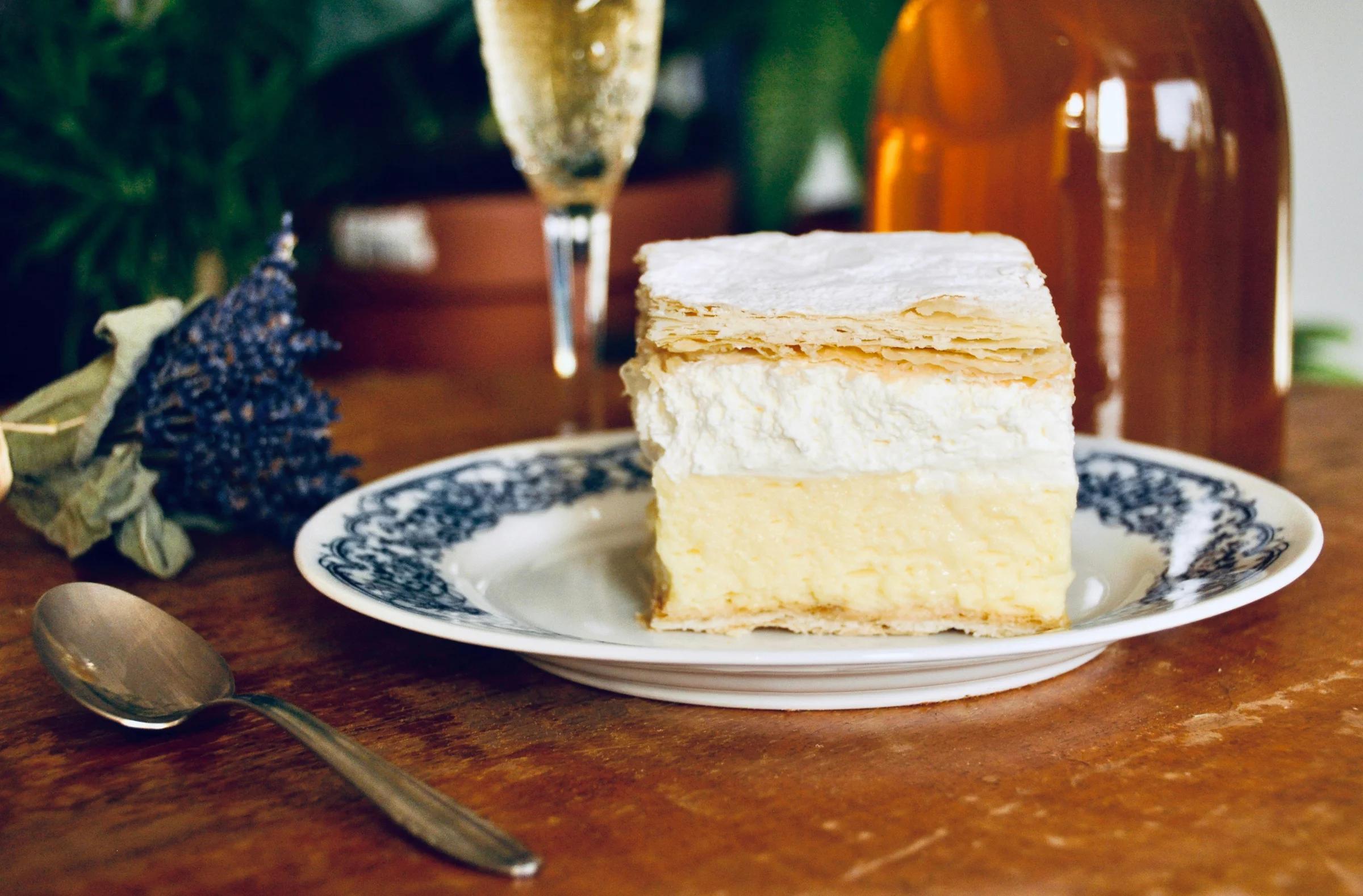 baked cake on white and blue ceramic plate