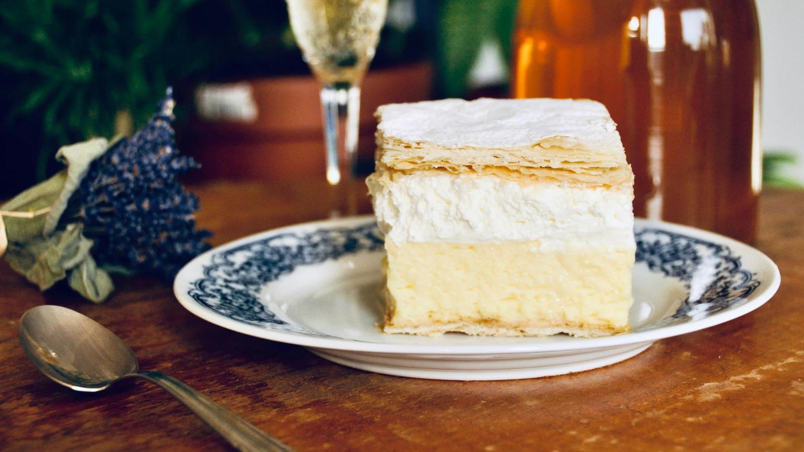 baked cake on white and blue ceramic plate