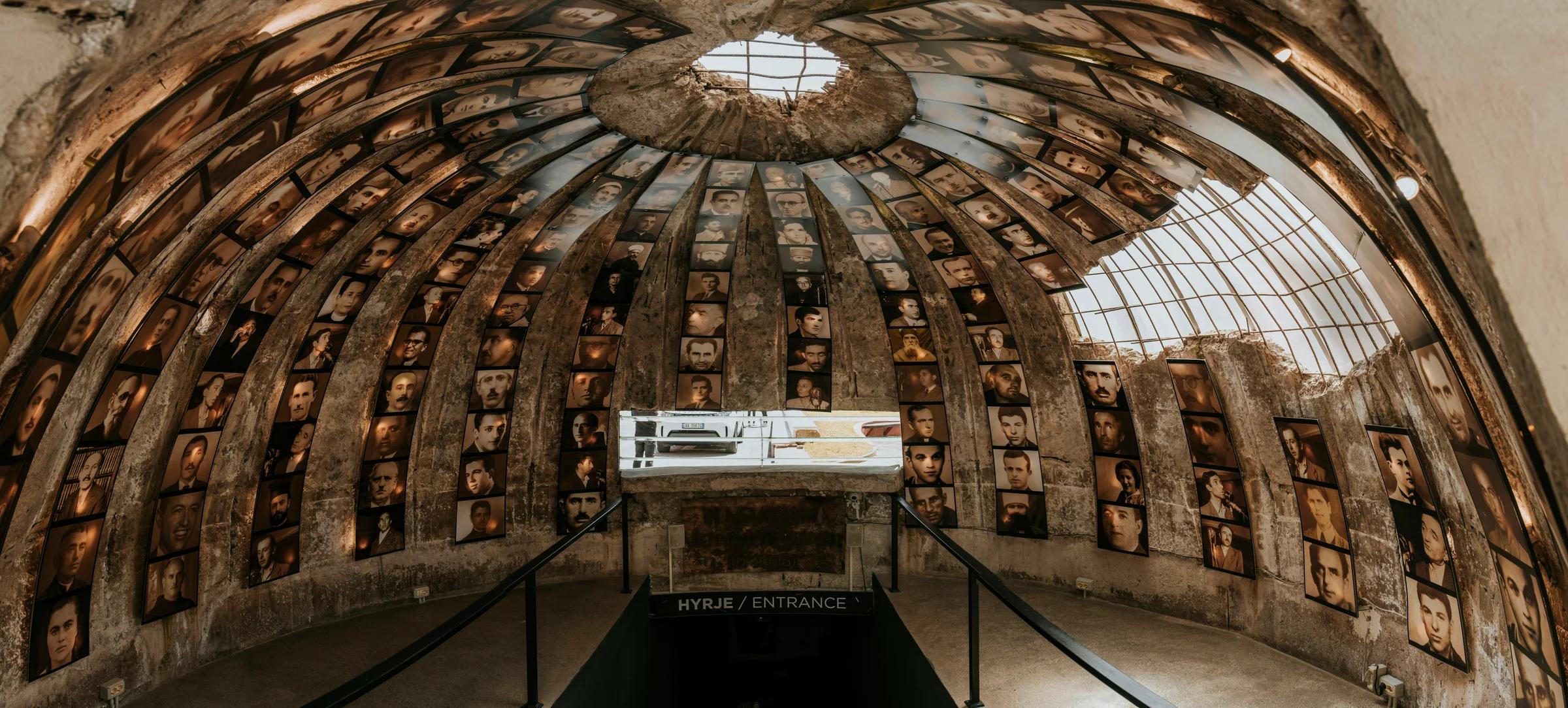 a large stone building with a staircase