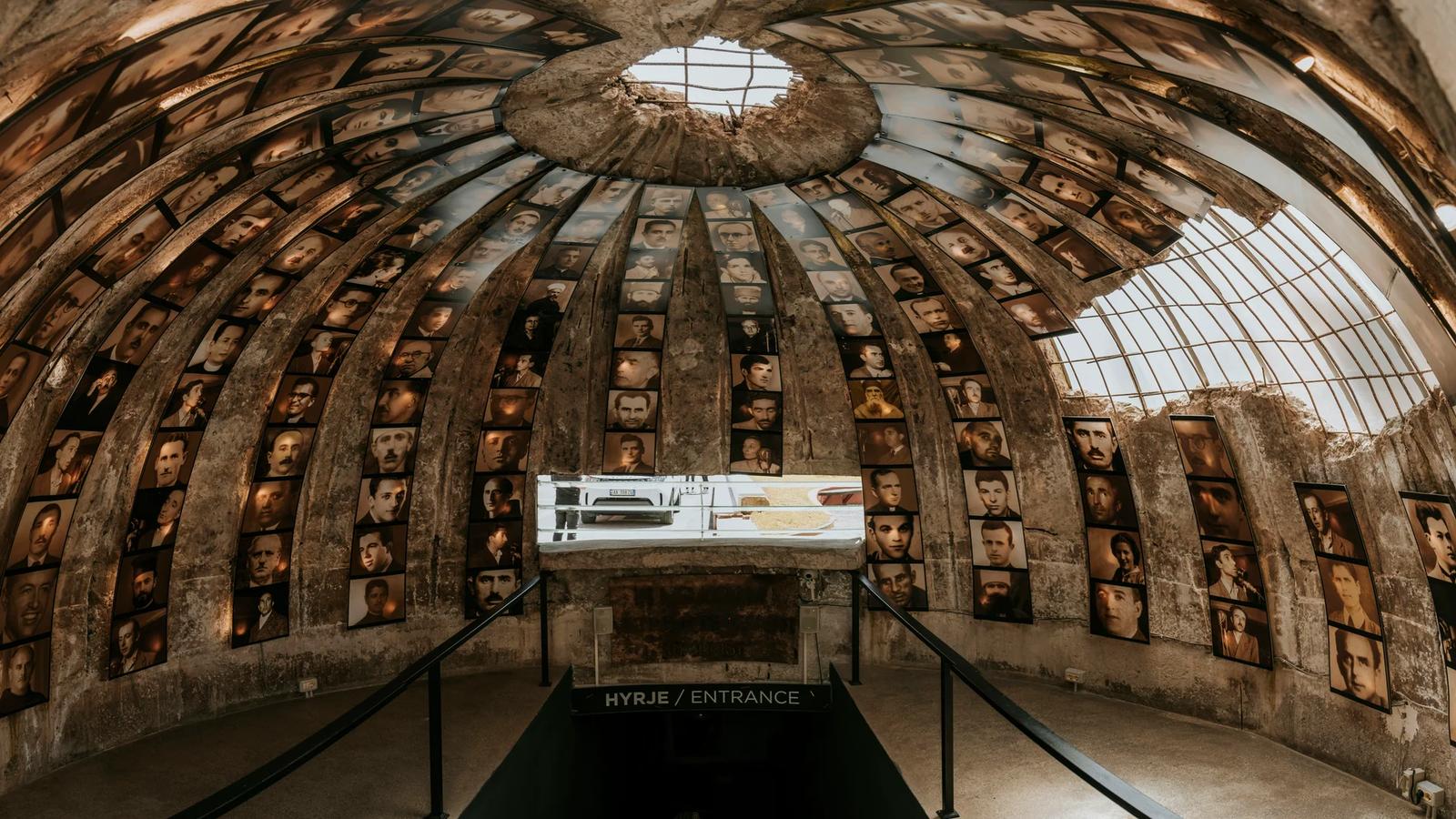 a large stone building with a staircase