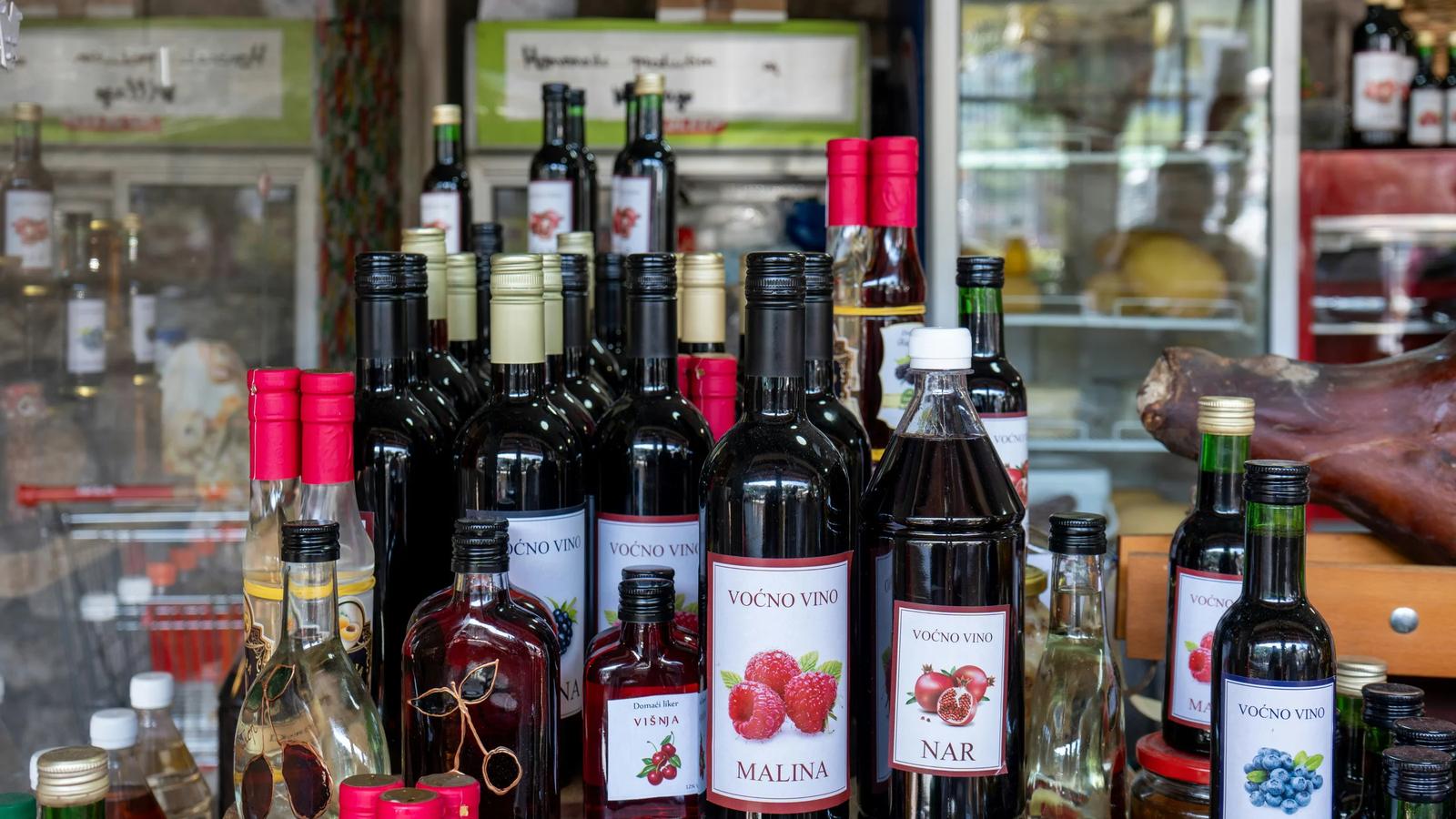 a display of various bottles of alcohol on a table